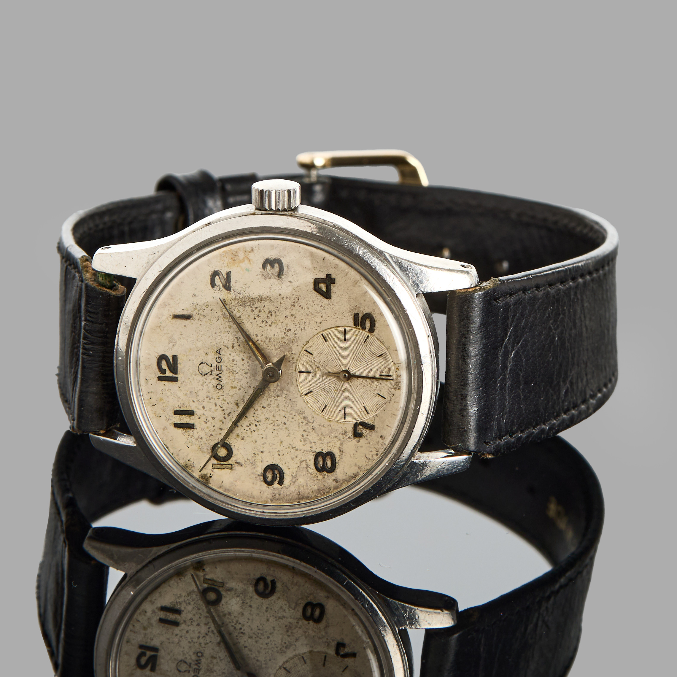 OMEGA, armbandsur, stål, manuell, 1950-tal, svart läderarmband.