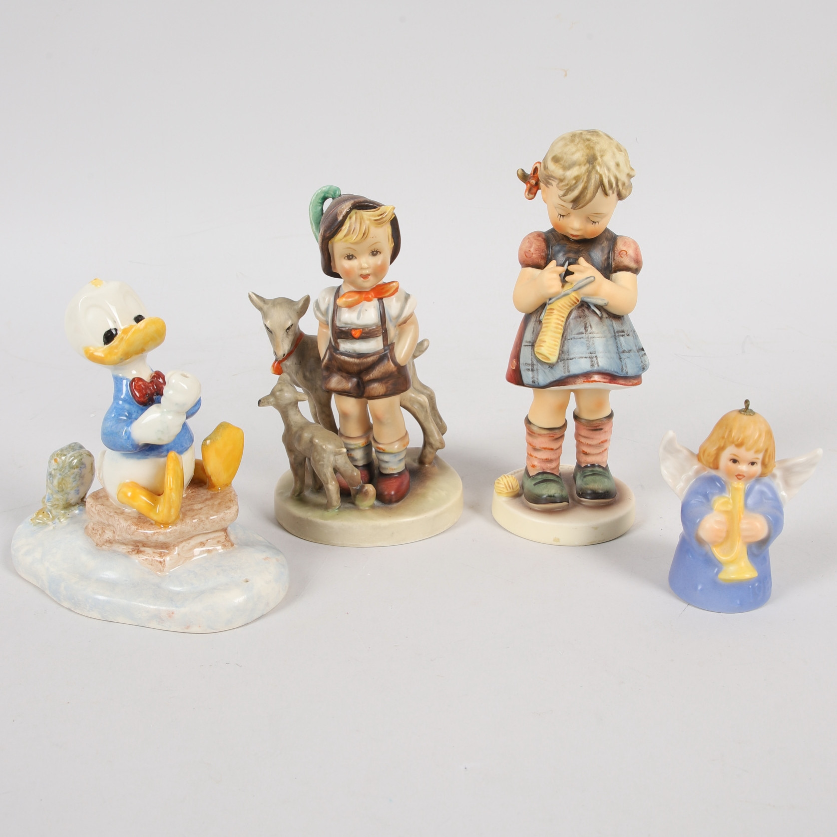 MARIA INNOCENTIA HUMMEL. Figuriner, 4 st, porslin, Goebel, Tyskland, 1900-talets andra hälft.