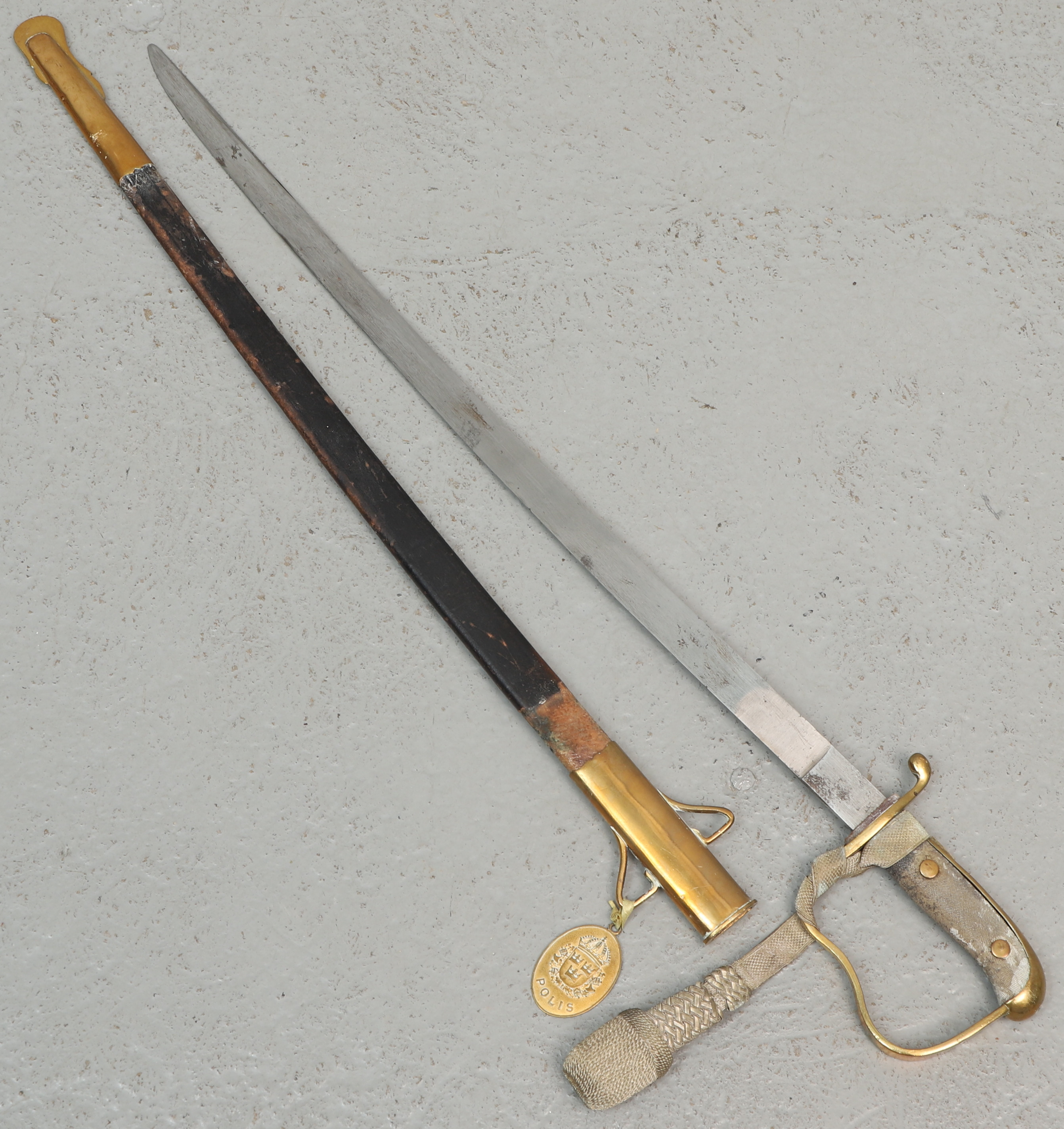 POLISSABEL med portopé och låsfunktion, märkt- Lunds Polisdistrikt, 1900-tal.