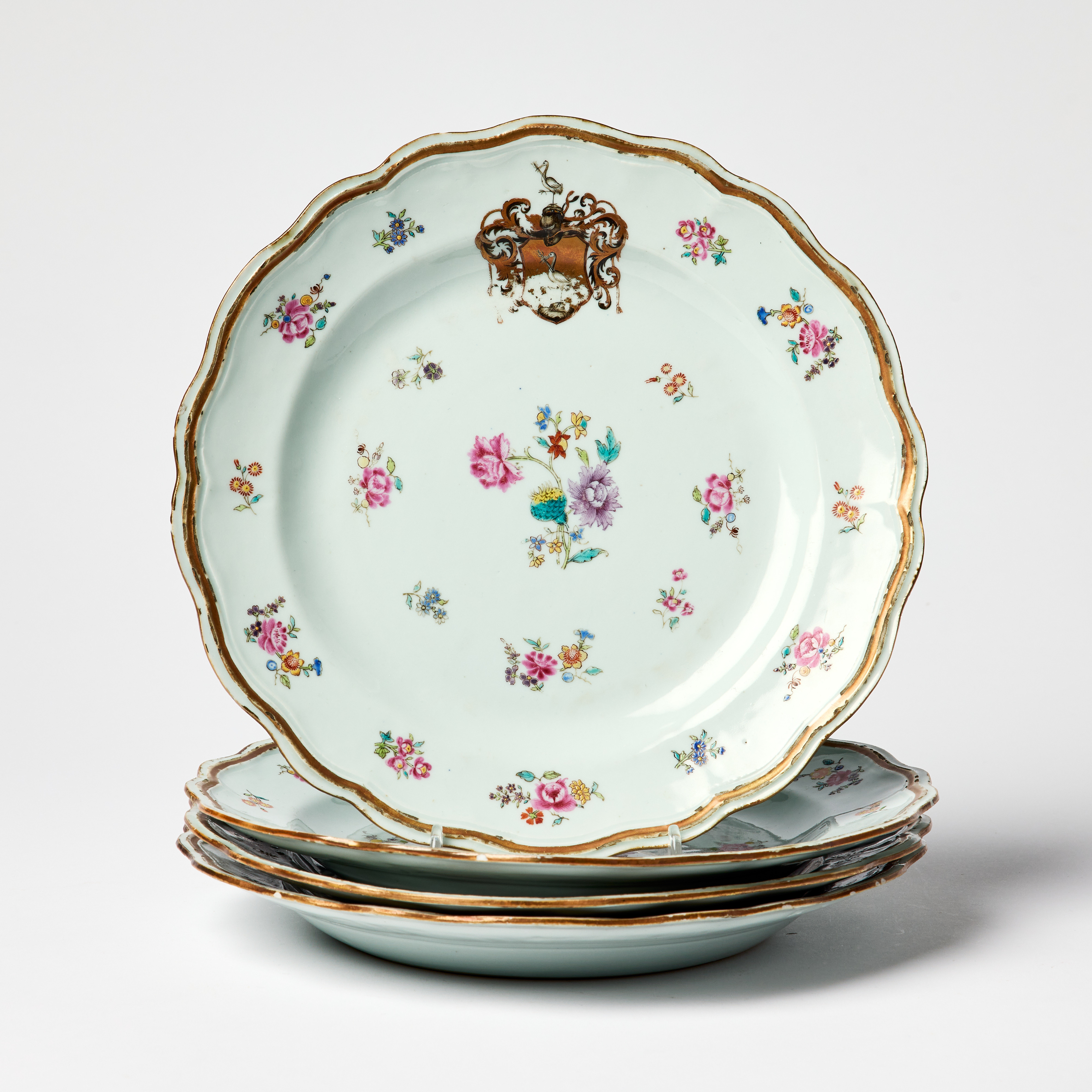 A Set of Four Chinese ’Grill Family’ Armorial Famille Rose Porcelain Plates.