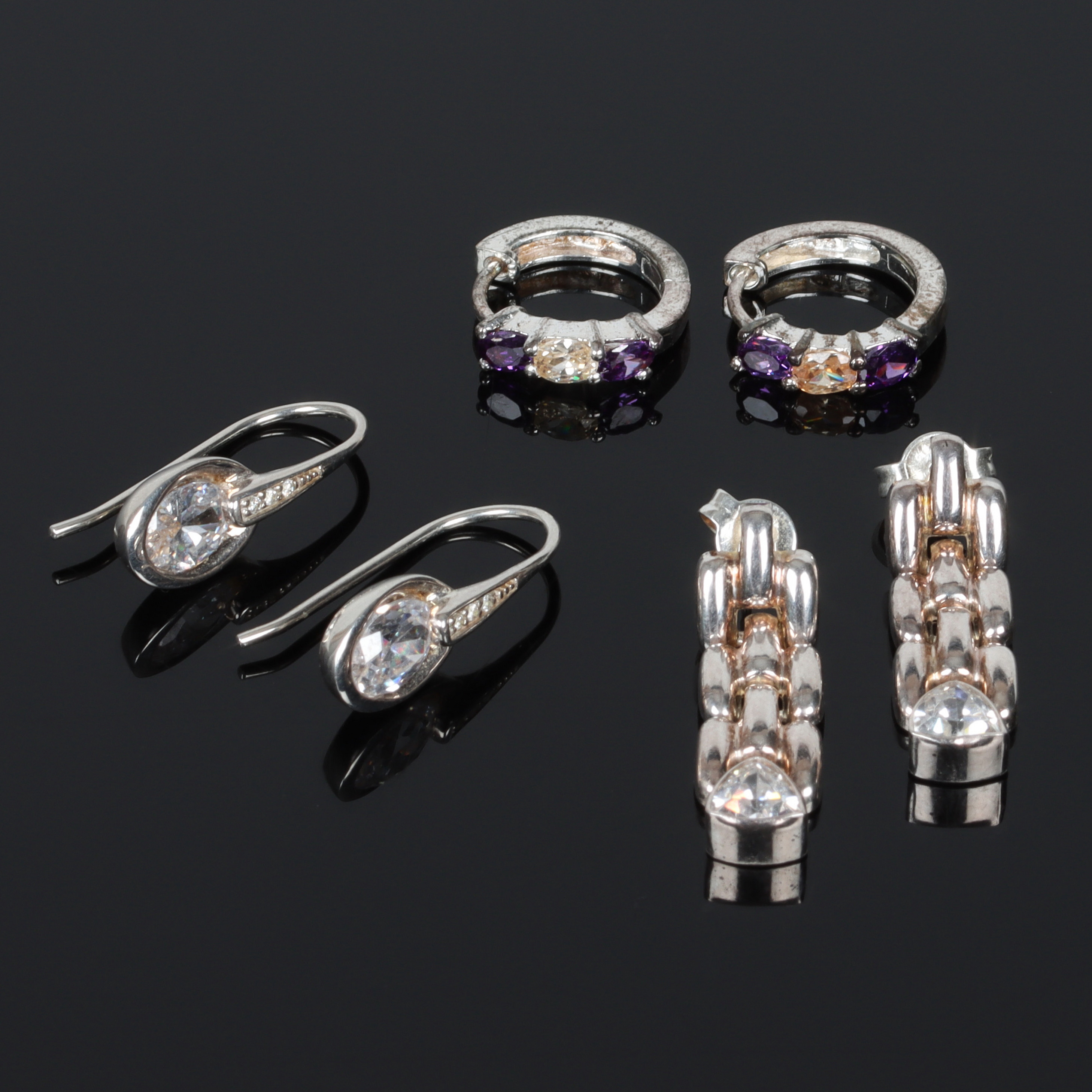 ÖRHÄNGEN, 3 par, sterlingsilver, med lila ametister och vita stenar, bland annat Handels AB IPO Sundsvall. 1900-tal.