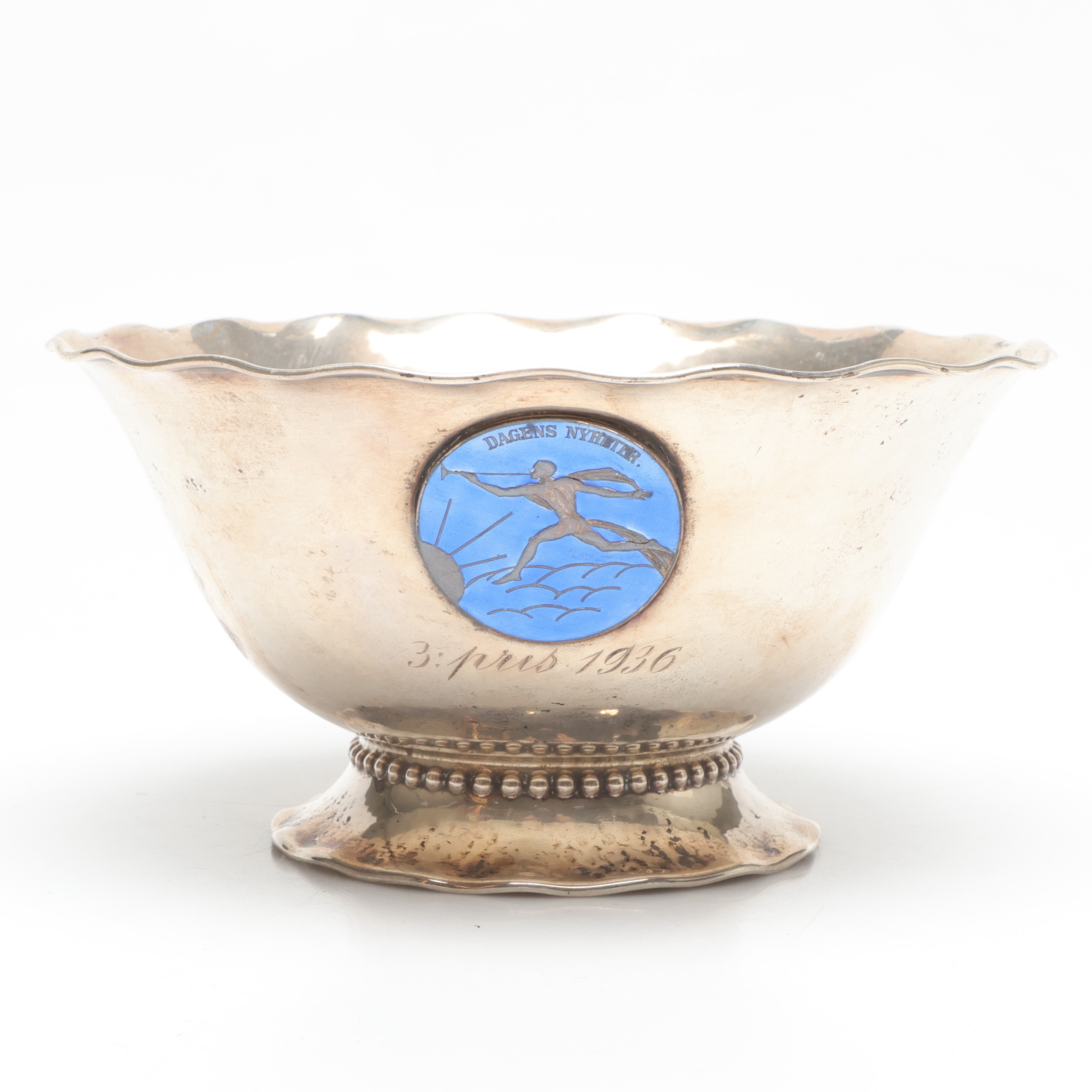 SKÅL, silver, emalj emblem med Dagens Nyheter, 1930-tal.