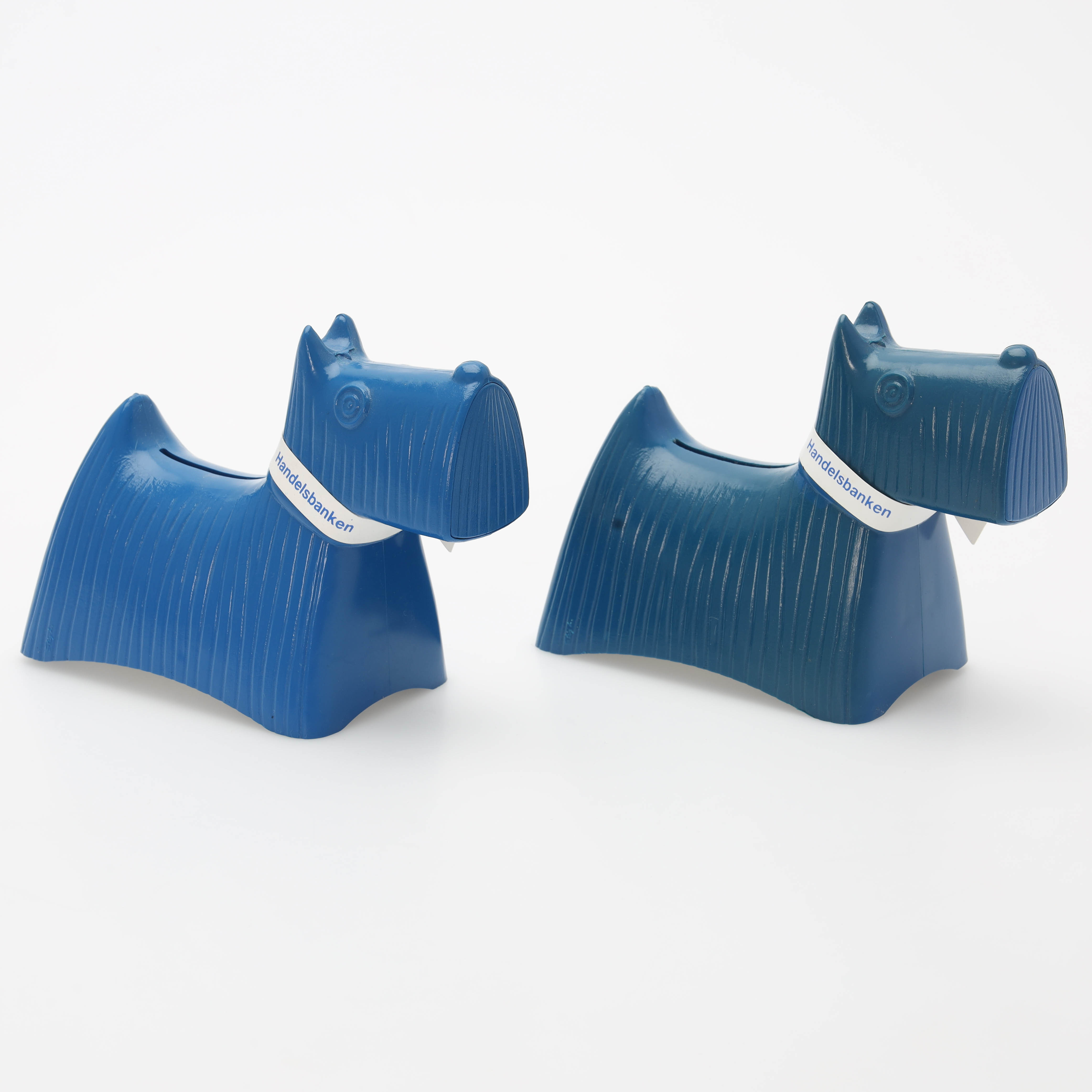 STIG LINDBERG. Sparbössor, 2 st, "Skotte", för Handelsbanken.