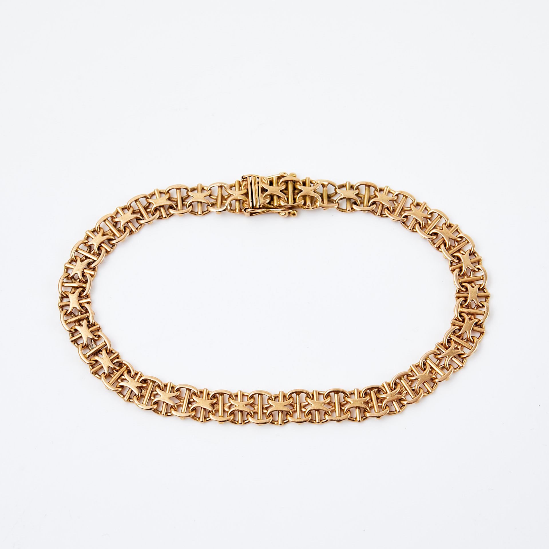 ARMBAND, 18 k guld, x-länk med stav, svenska kontrollstämplar.