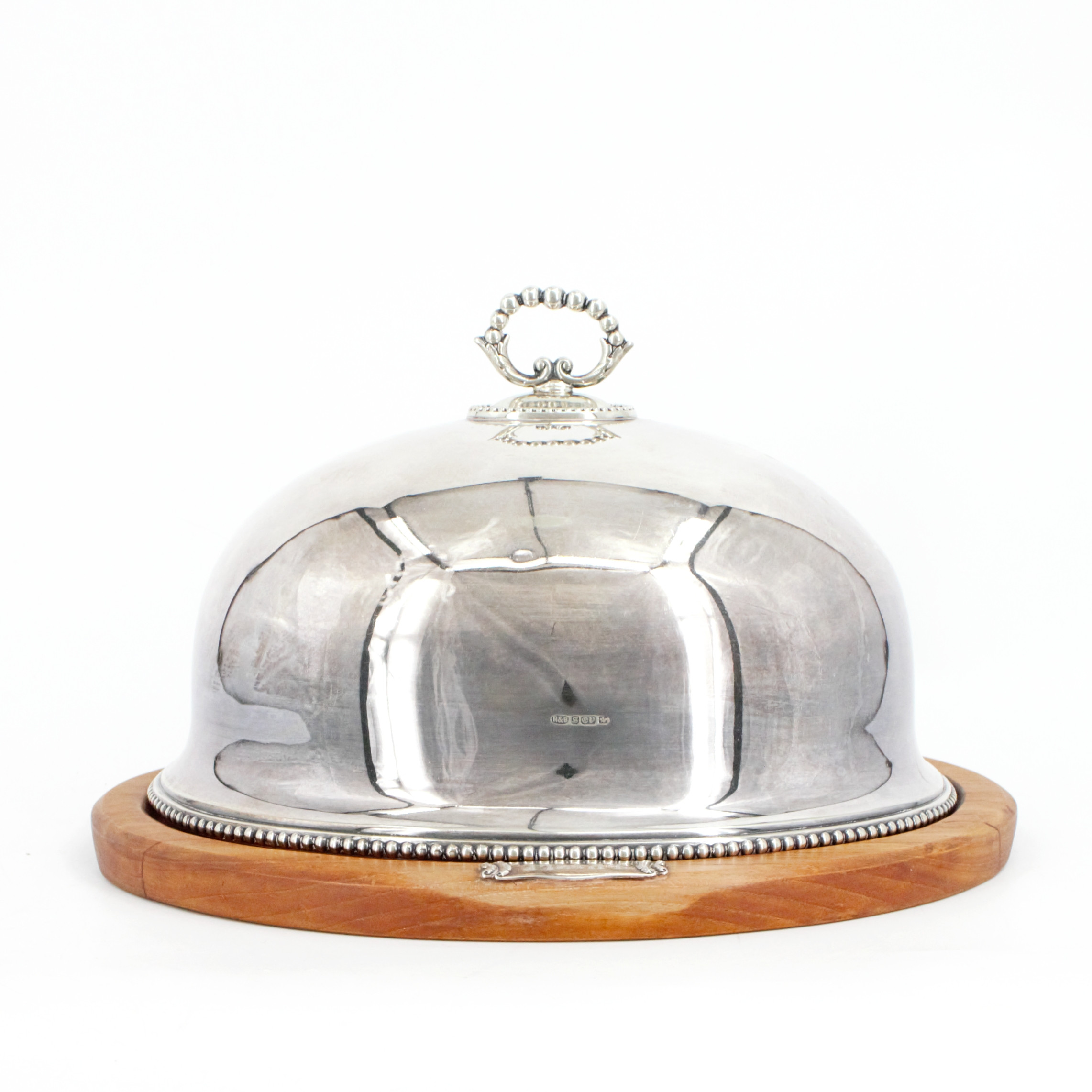 STEKHUV med SKÄRBRÄDA, silverpläterad huv, silverplakett med gravyr på skärbrädan av teak, 1968, England.