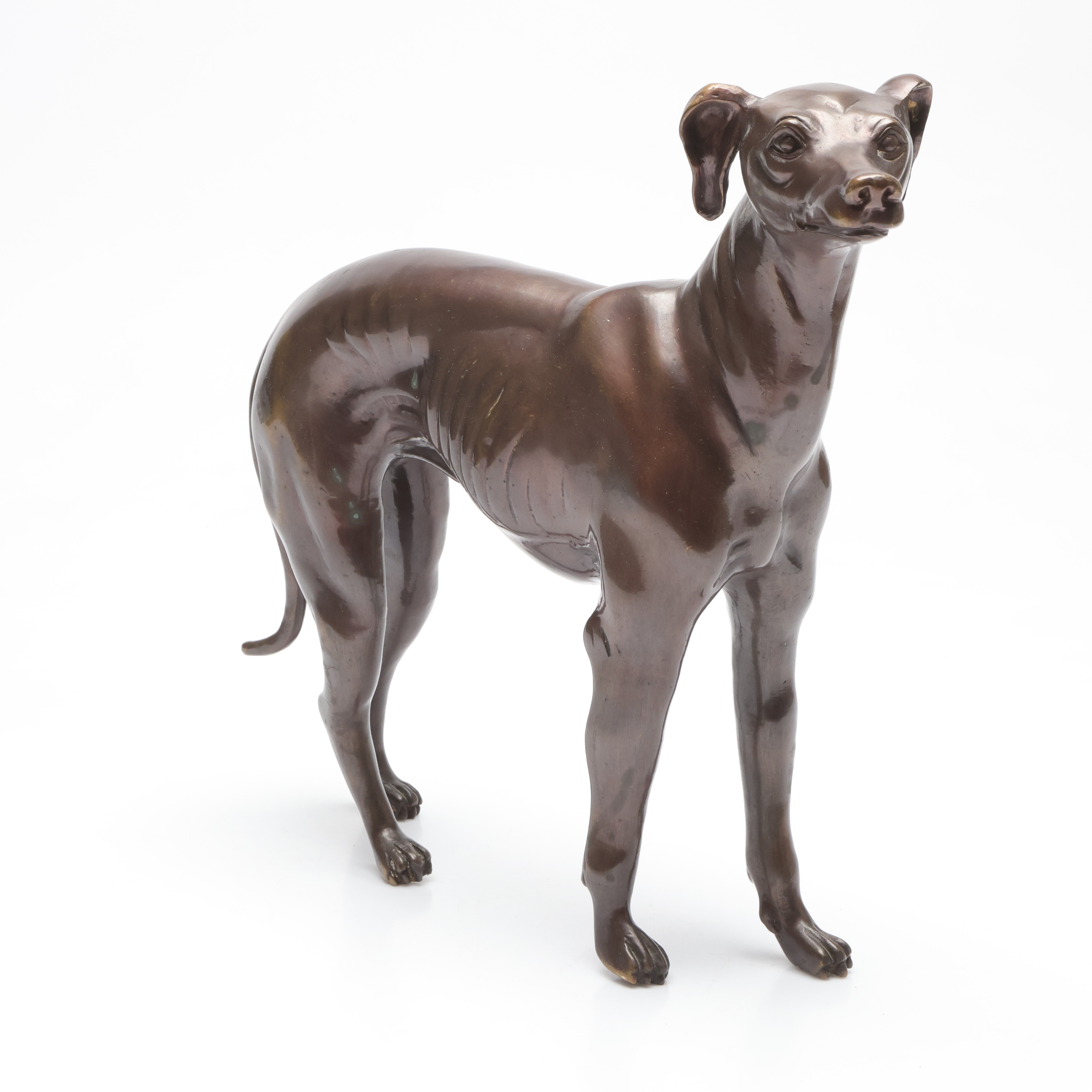 SKULPTUR, bronspatinerad metall, i form av vinthund, 1900-talets första hälft.