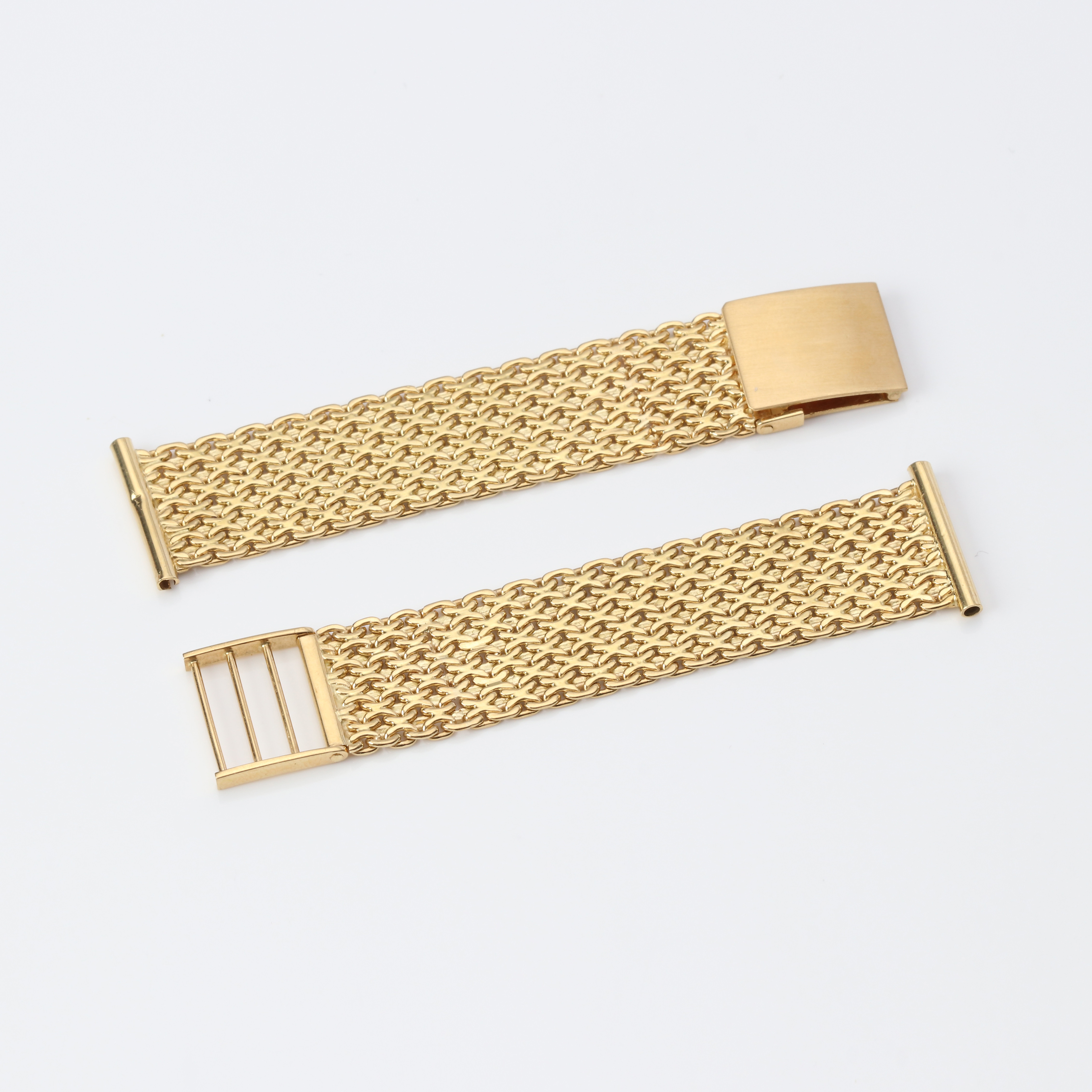 KLOCKARMBAND. 18k guld, X-länk, stämplad i Stockholm, vikt ca 39,2 gram.