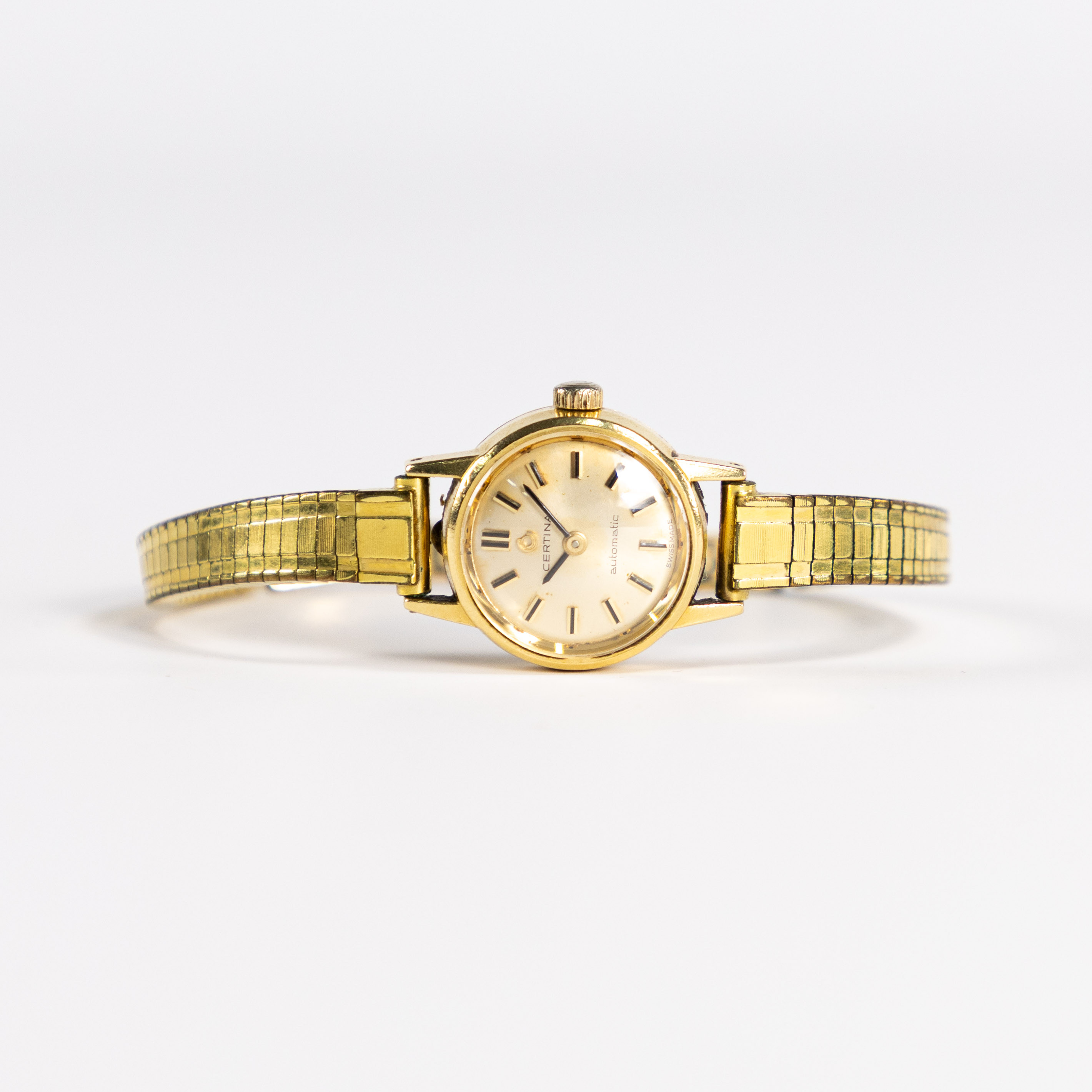 CERTINA. 18 mm, 18k guld, 60/70-tal.