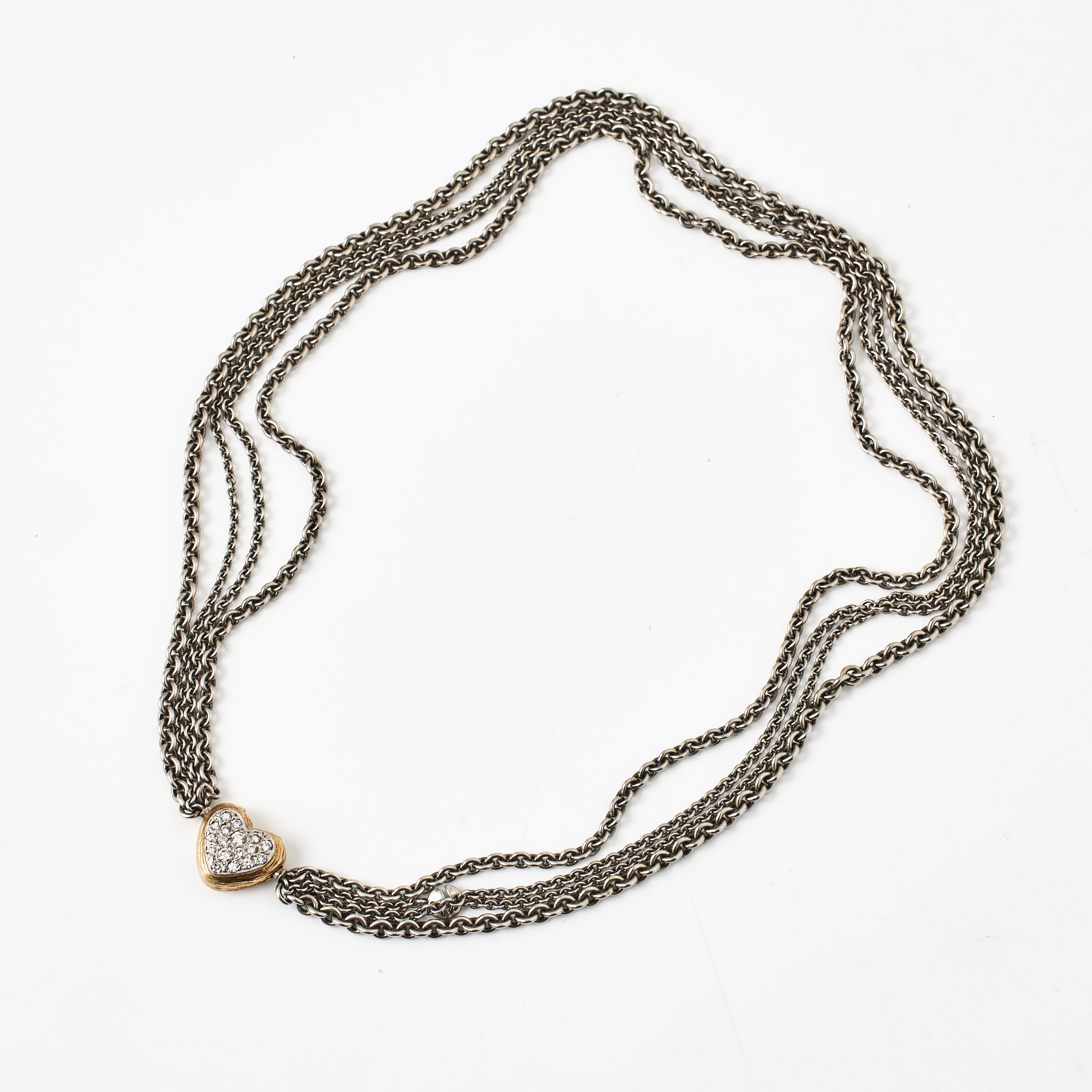 OLE LYNGGAARD, collier, 4 rader ärtlänkar i olika storlekar, sterlingsilver, LÅS, 18 k guld, i form av ett hjärta med 17 pavéfattade briljanter totalt ca 0,42 ct.