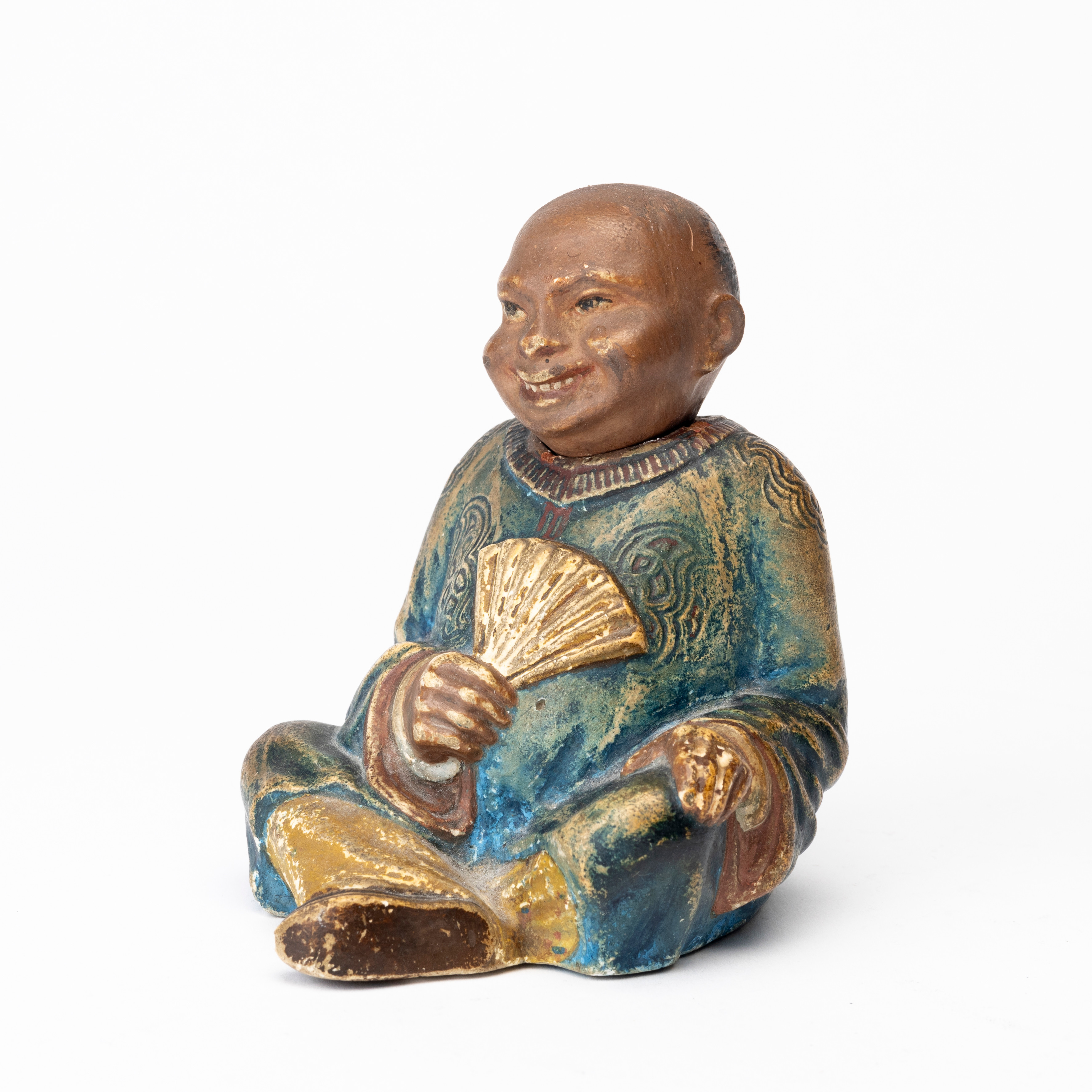 Nickedocka, keramik, Asiatisk sittande man, 18/1900-tal.