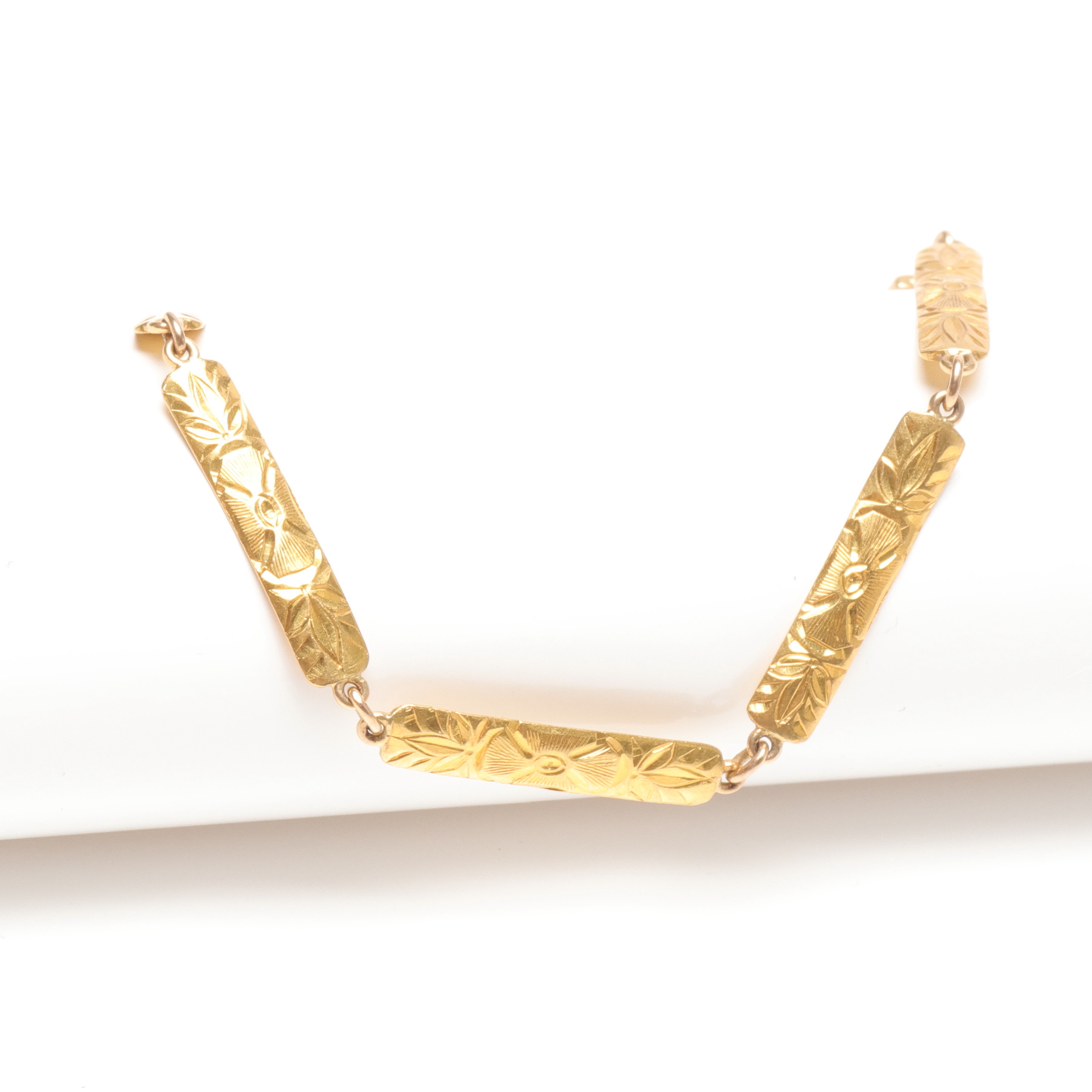 ARMBAND, 18k samt 23k guld, total vikt ca 9,1 gram.