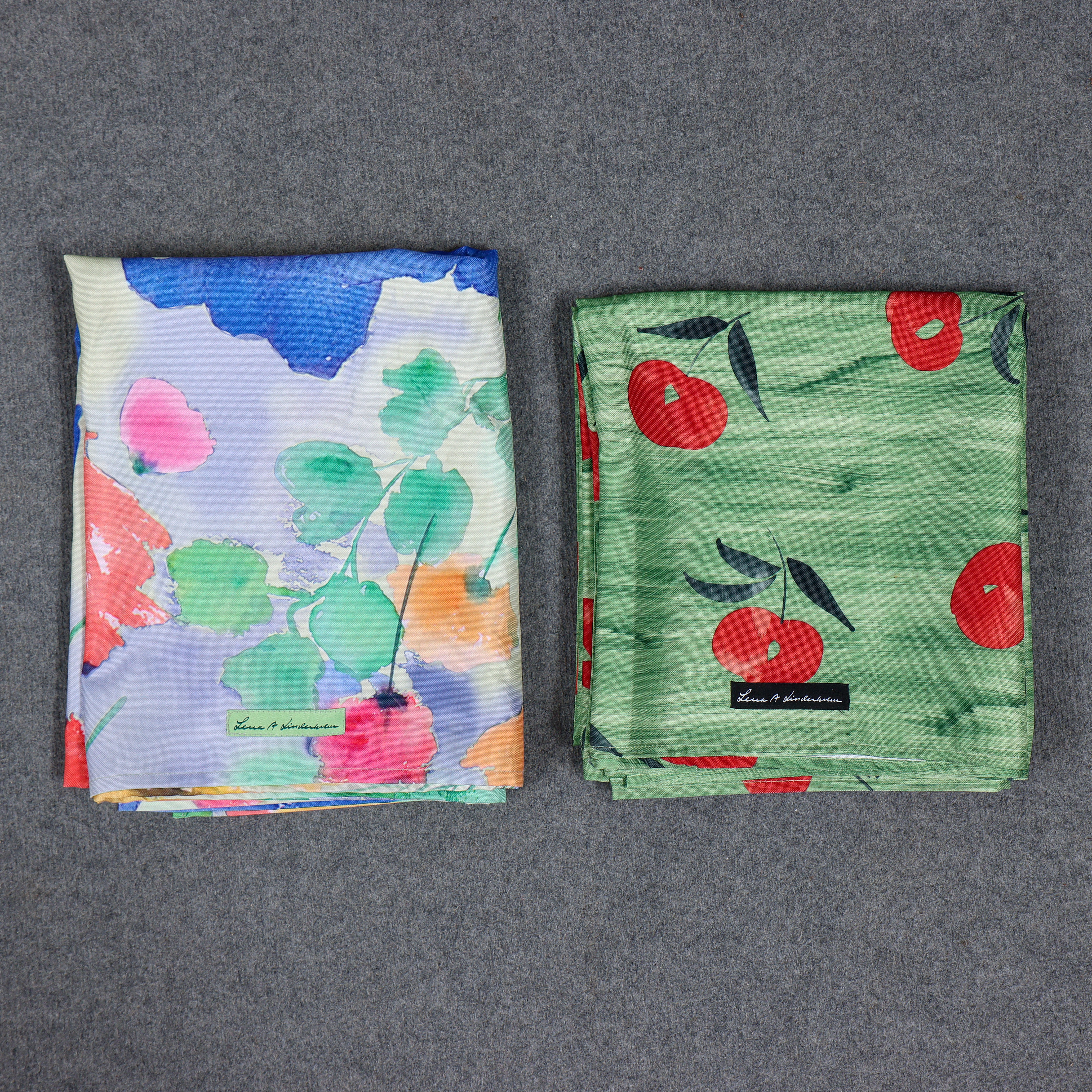 LENA A. LINDERHOLM, TVÅ DUKAR, MOTIV AV BLOMSTER 140x220cm, MOTIV AV ÄPPLEN 120x220cm.