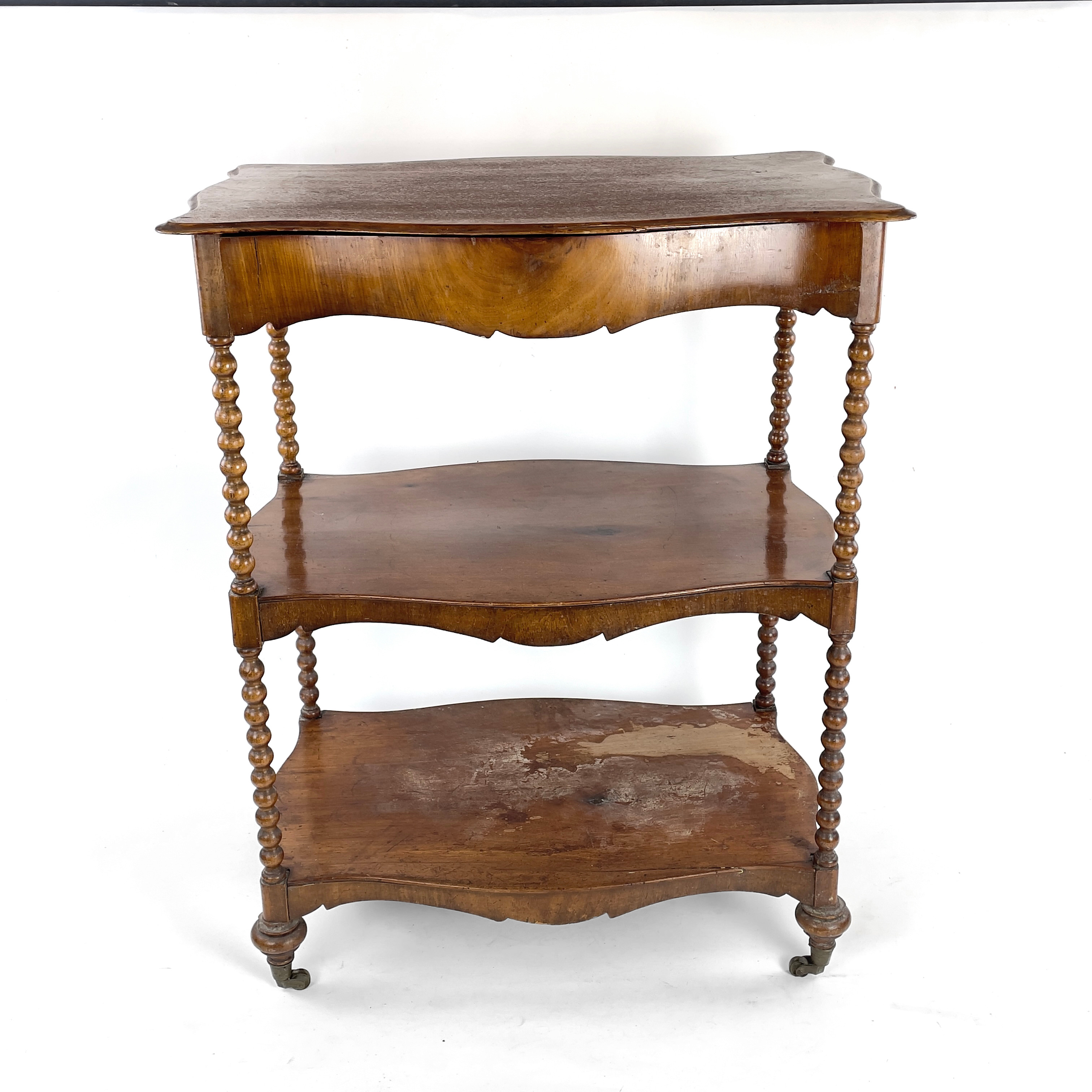 ETAGEBORD, på hjultrissor. Fanerat trä, omkring 1900-tal.