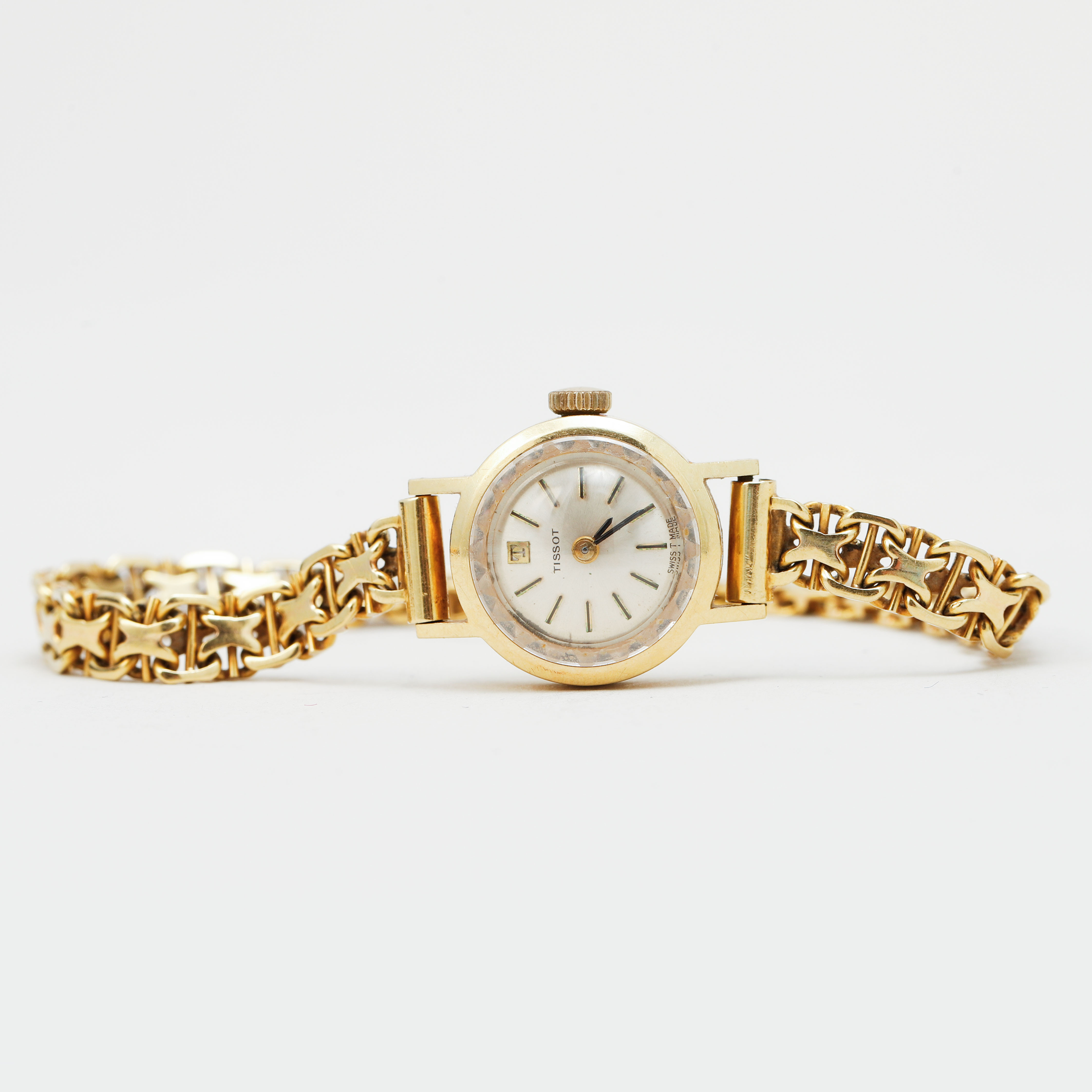 ARMBANDSUR, Tissot, 18k guld i boett och länk, manuell.