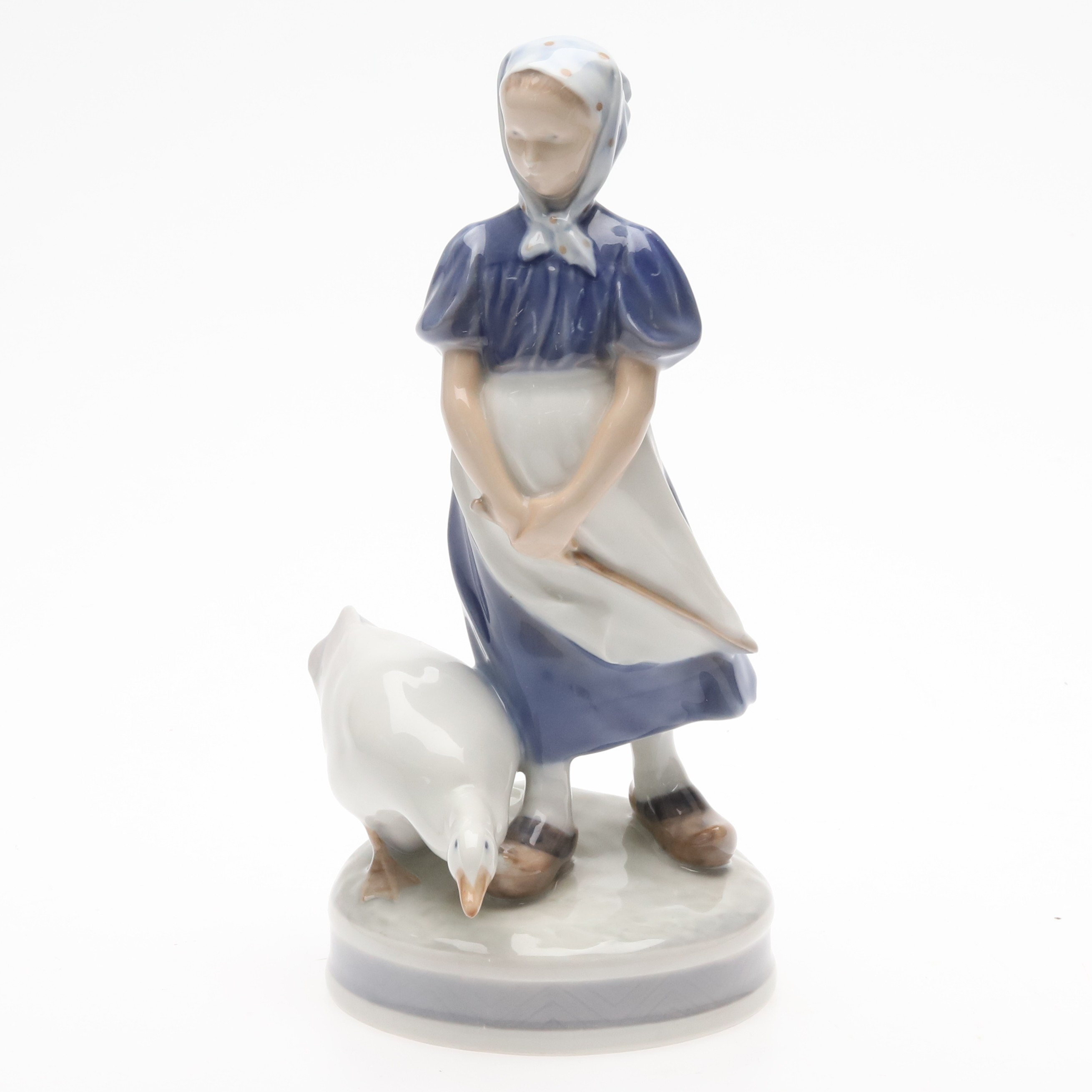 FIGURIN. Porslin, "Flicka med gås", förstasortering, Royal Copenhagen, Danmark.