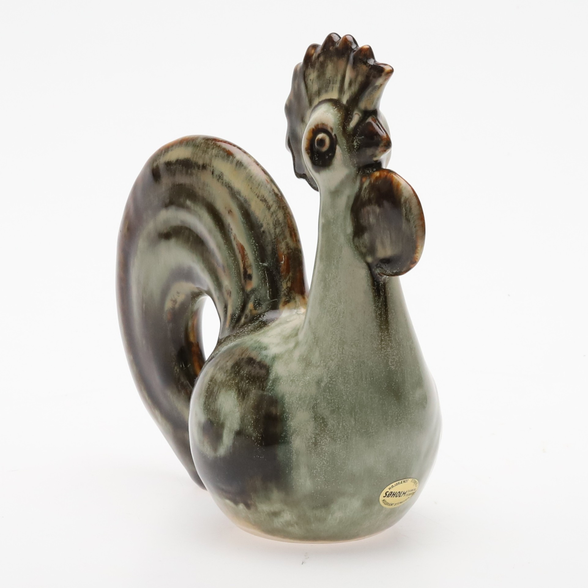 JOSEPH SIMON. Figurin, tupp, stengods, etikett-märkt Søholm, Danmark.