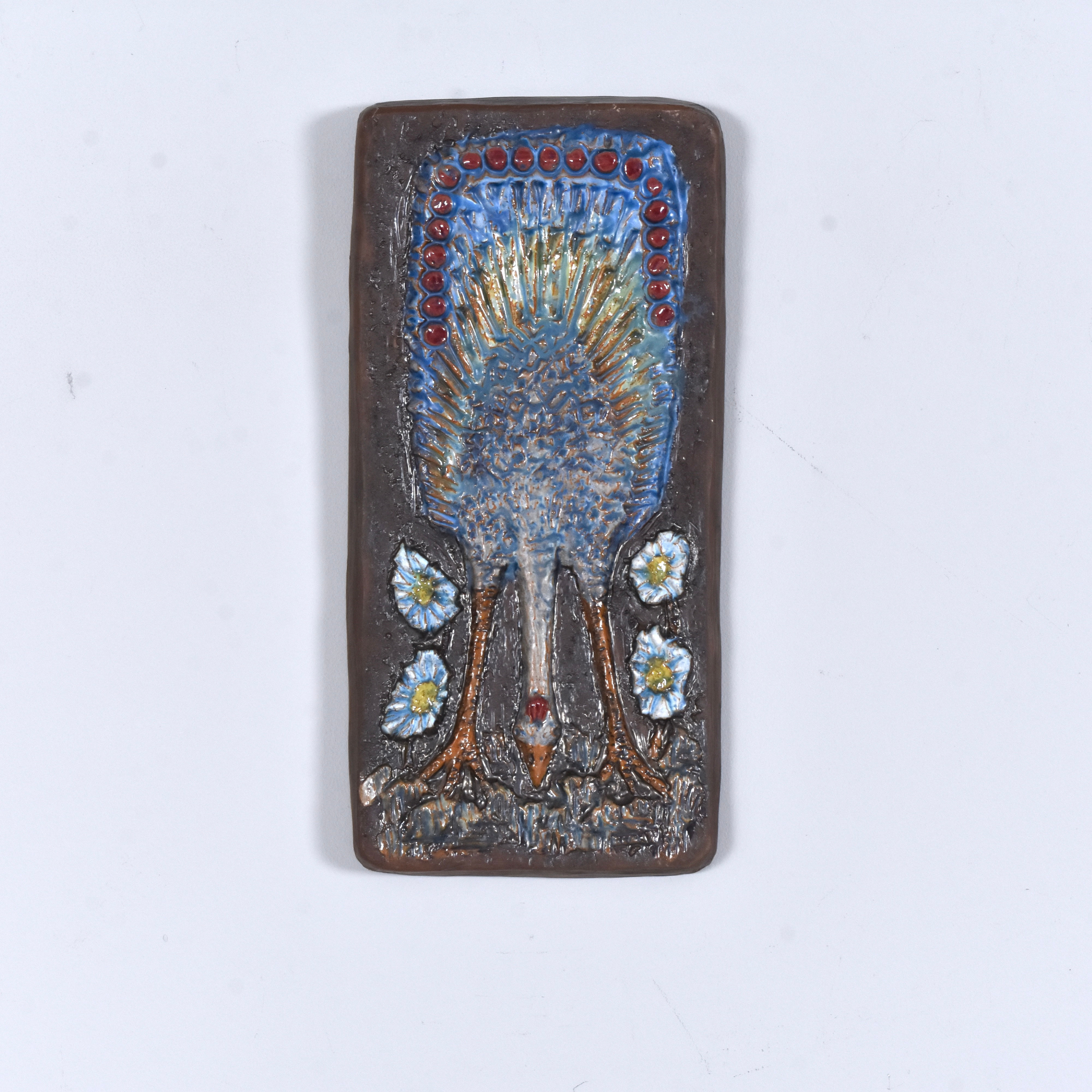 BERTH NORRMAN. väggrelief, glaserat lergods, struts, Norrmans Motala.