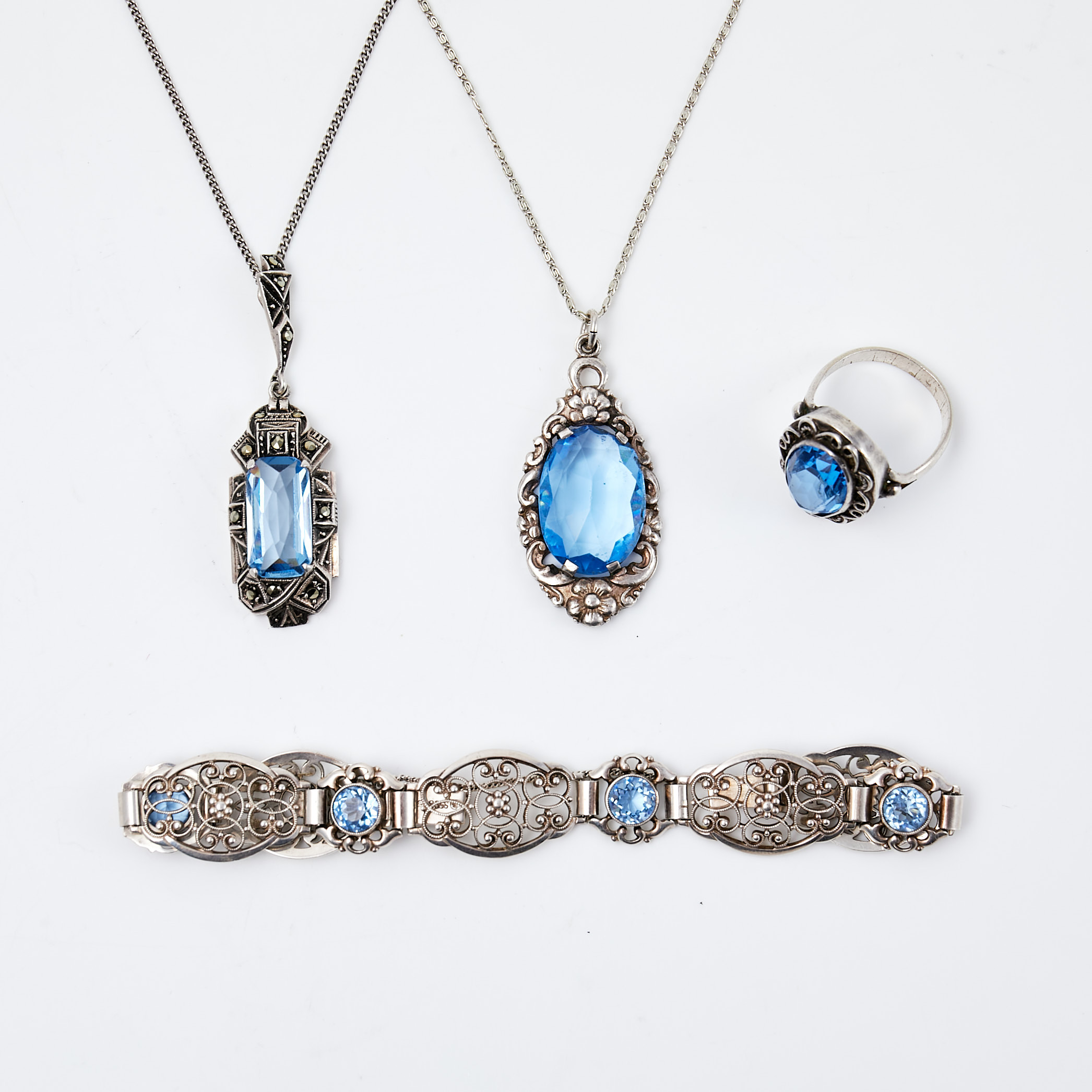 HALSBAND, 2 st, ARMBAND, RING, silver, fasettslipade syntetiska spineller respektive glas, ett halsband med fasettslipade markasiter, 1900-talets mitt.