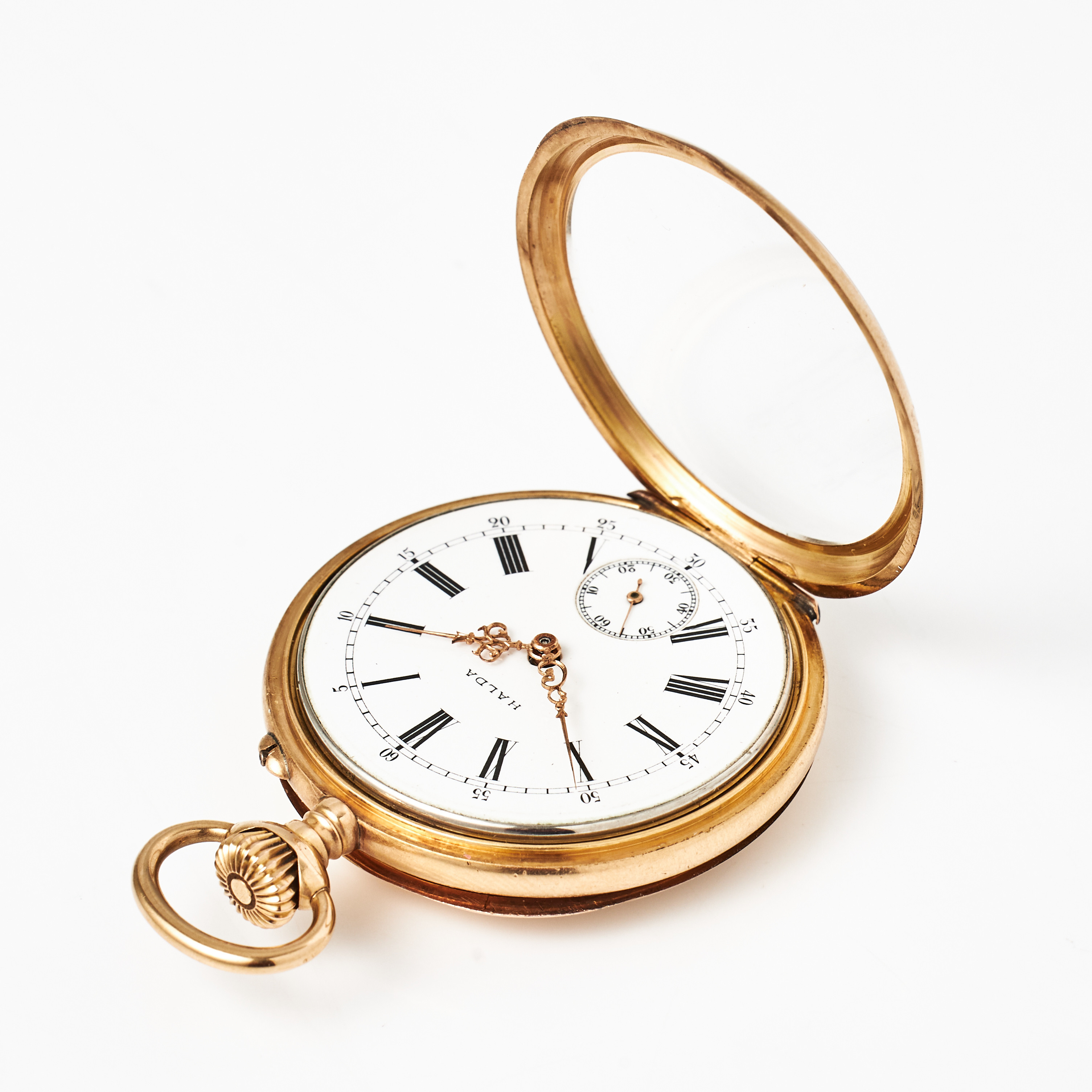 HALDA FICKURSFABRIK, fickur, 14 k guld, vitemaljerad urtavla, romerska siffror, plexiglas.