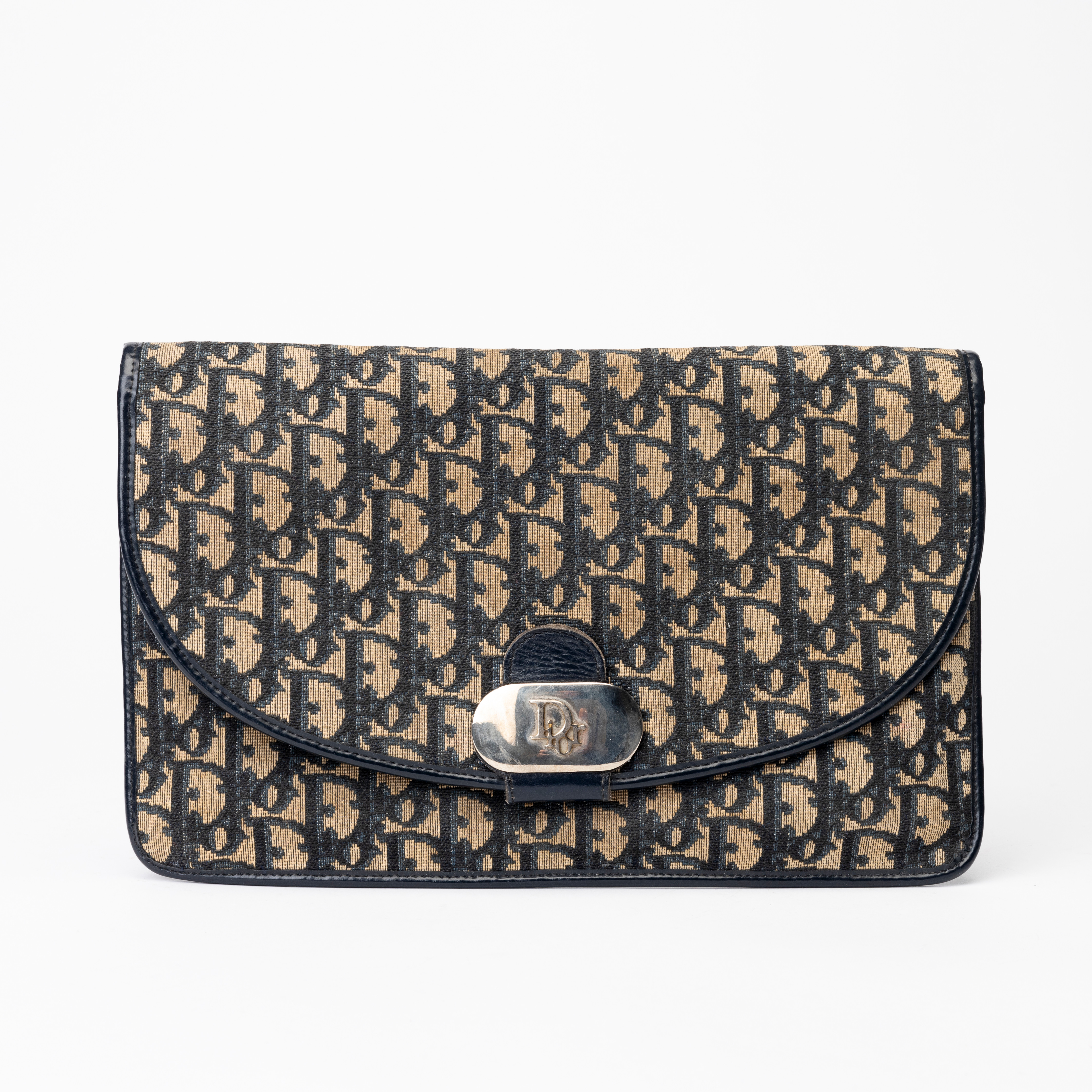 CHRISTIAN DIOR. Clutch med lock, Oblique, jacquard, Paris, Frankrike, 1970-tal.