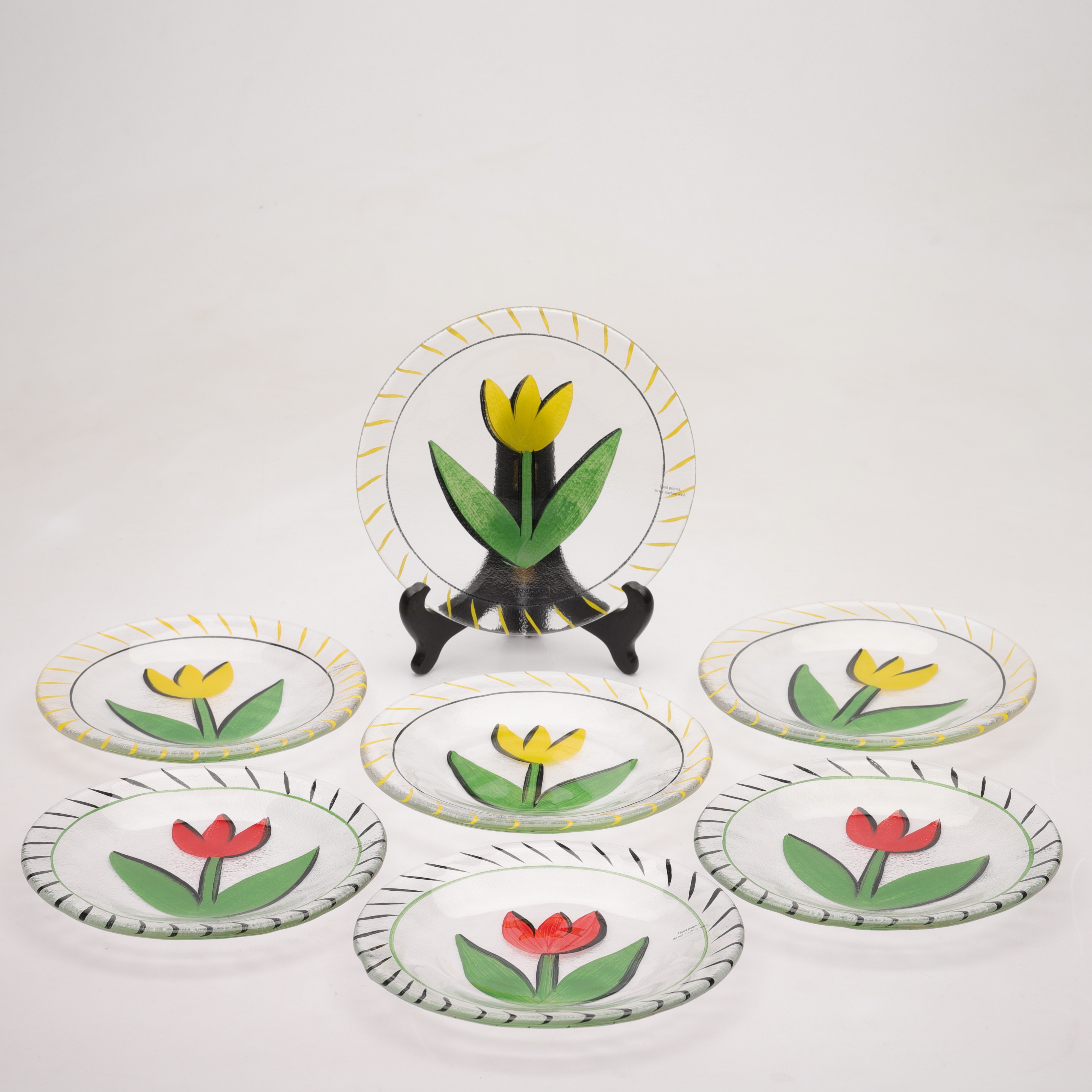 ULRICA HYDMAN-VALLIEN. assietter, 7 st, glas, "Tulipa", Kosta Boda, Sverige.