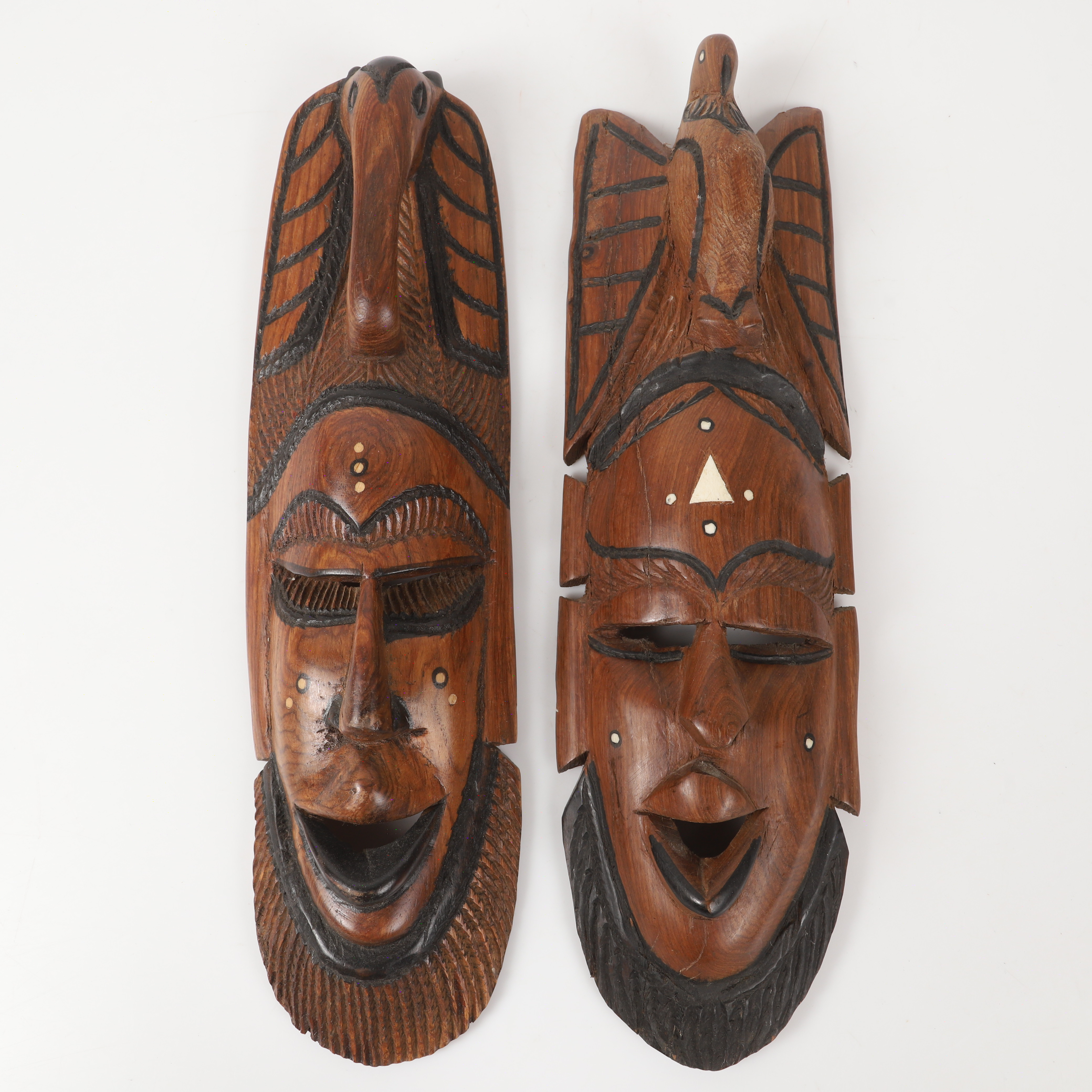 MASKER, 2 stycken, skuret trä, Afrika.