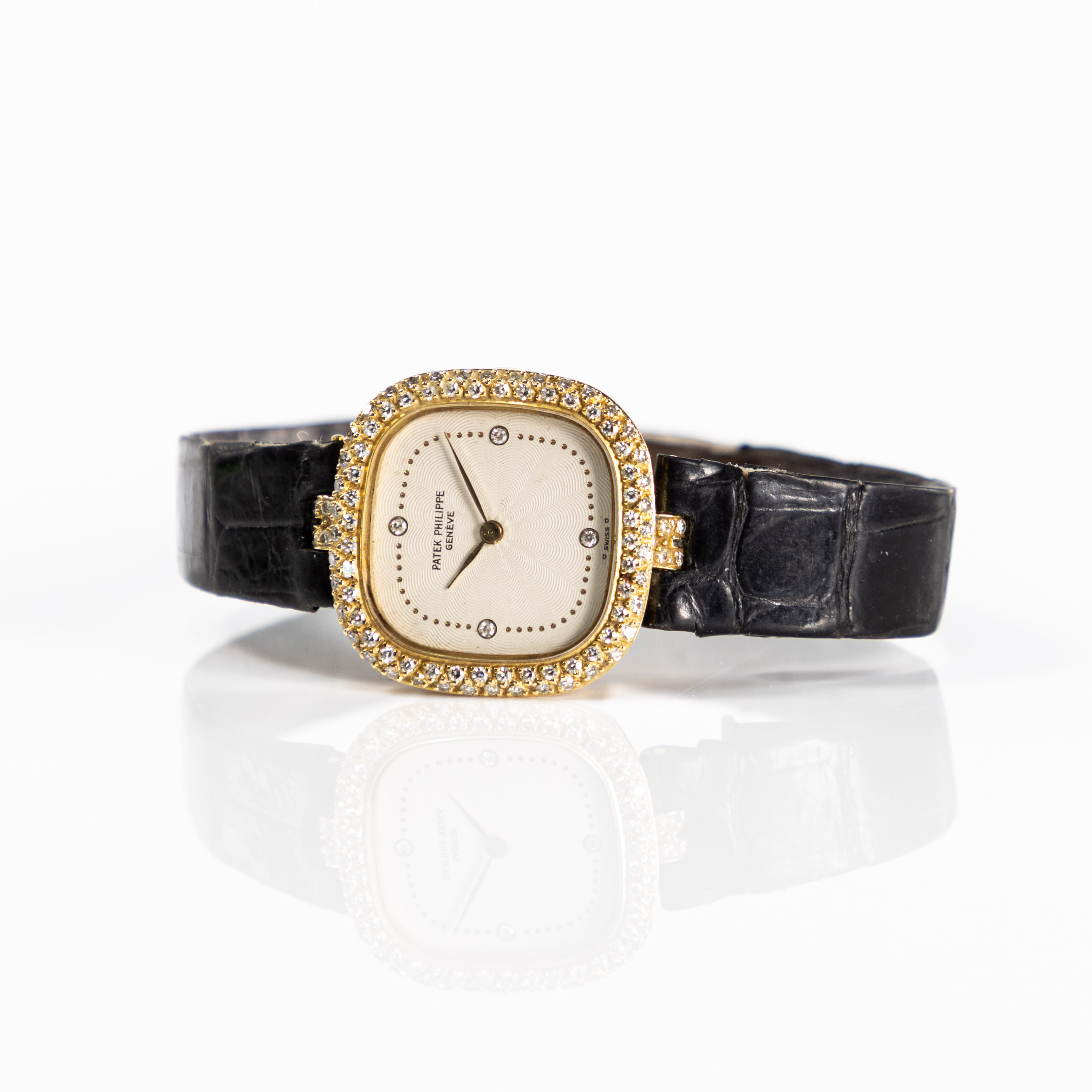 PATEK PHILIPPE. 23x23 mm, 18k guld, briljanter.