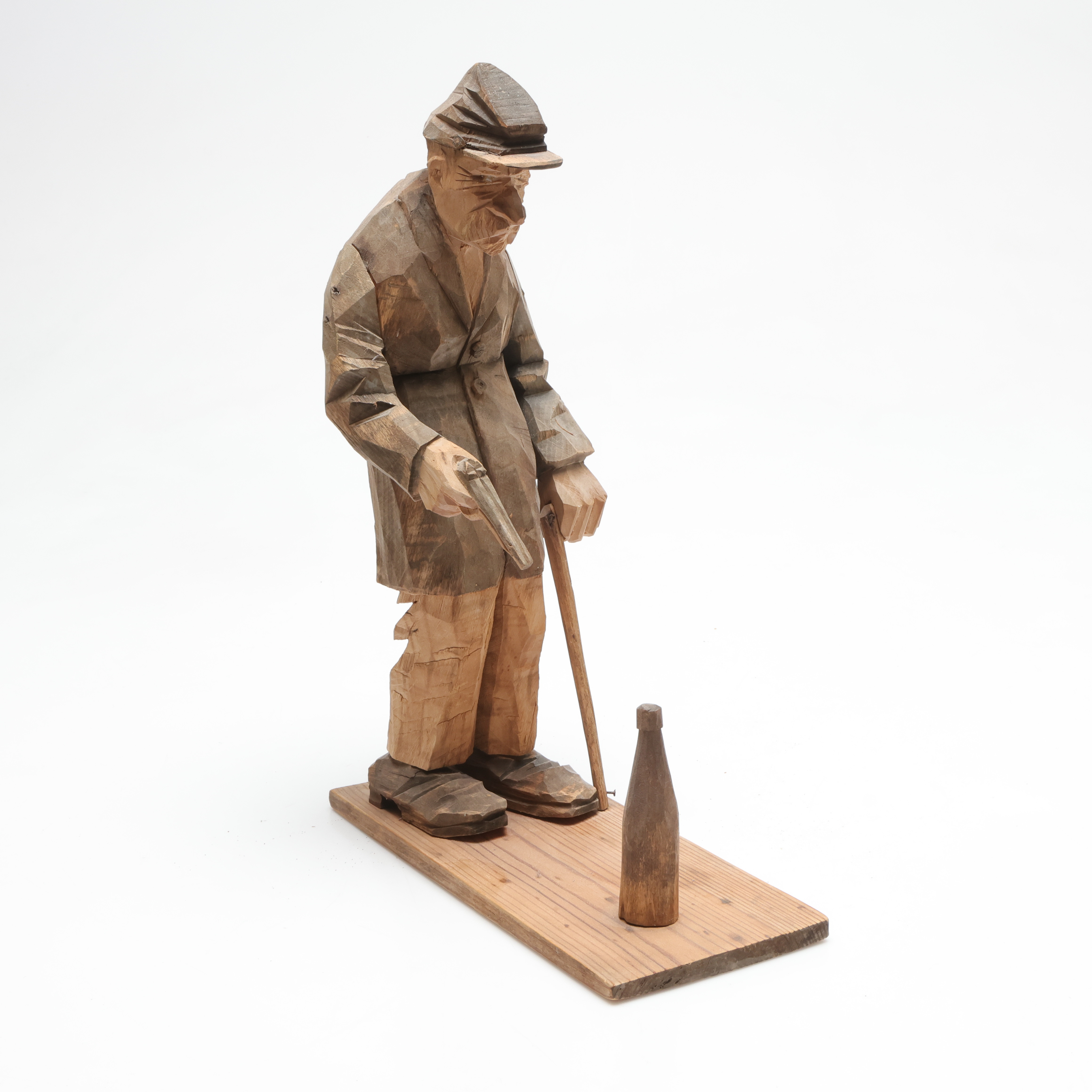 CARL JOHAN TRYGG. skulptur, man som skjuter på flaska, signerade.