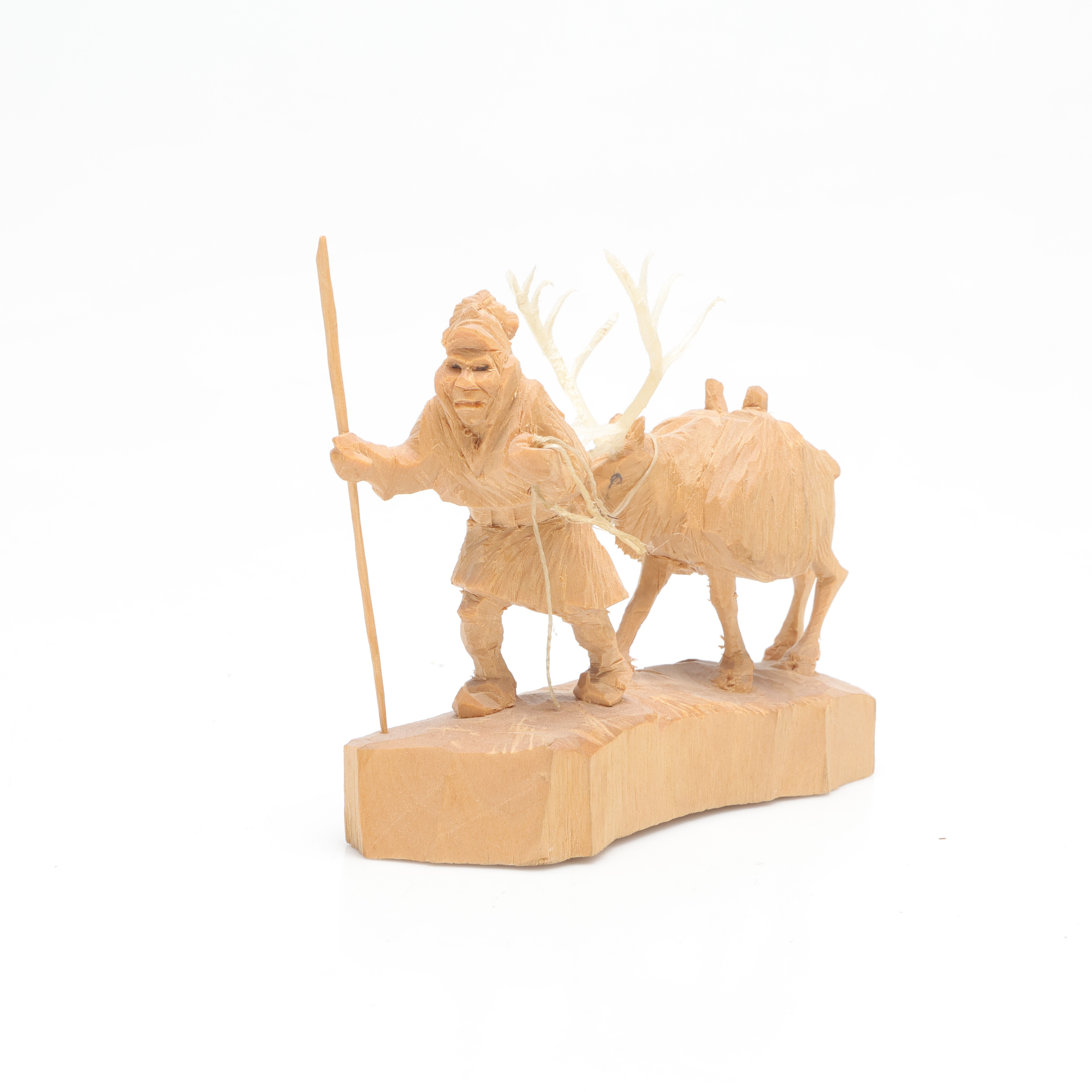 MARTIN STENSTRÖM (1912-2001). skulptur, föreställande vandrande same med ren, skuret trä, monogramsignerad M.S.