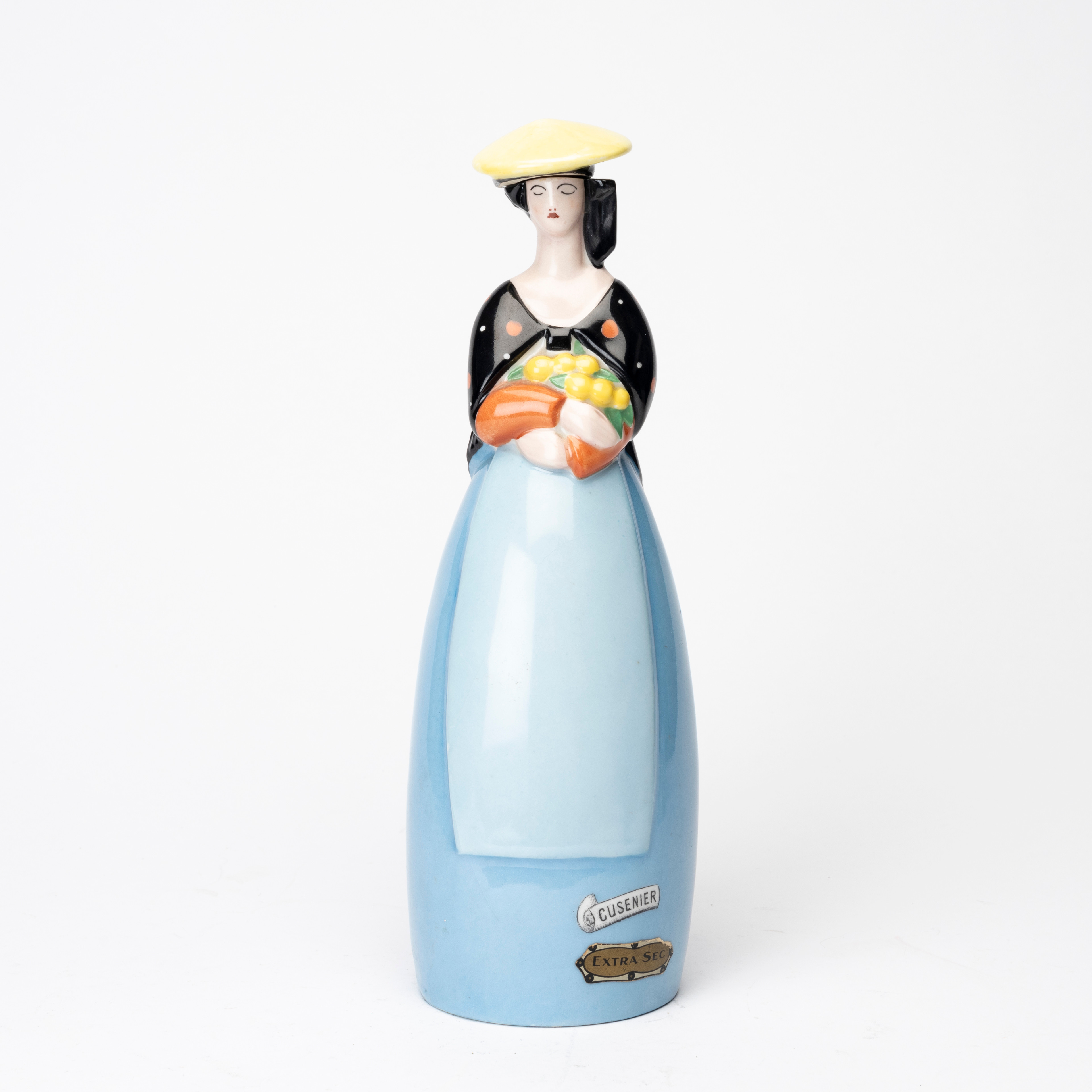 LIKÖRFLASKA, porslin, "Cusenier", kvinna med frukter, Robj, art deco, Paria, Frankrike, etikett och stämpelmärkt, 1920-/1930-tal.