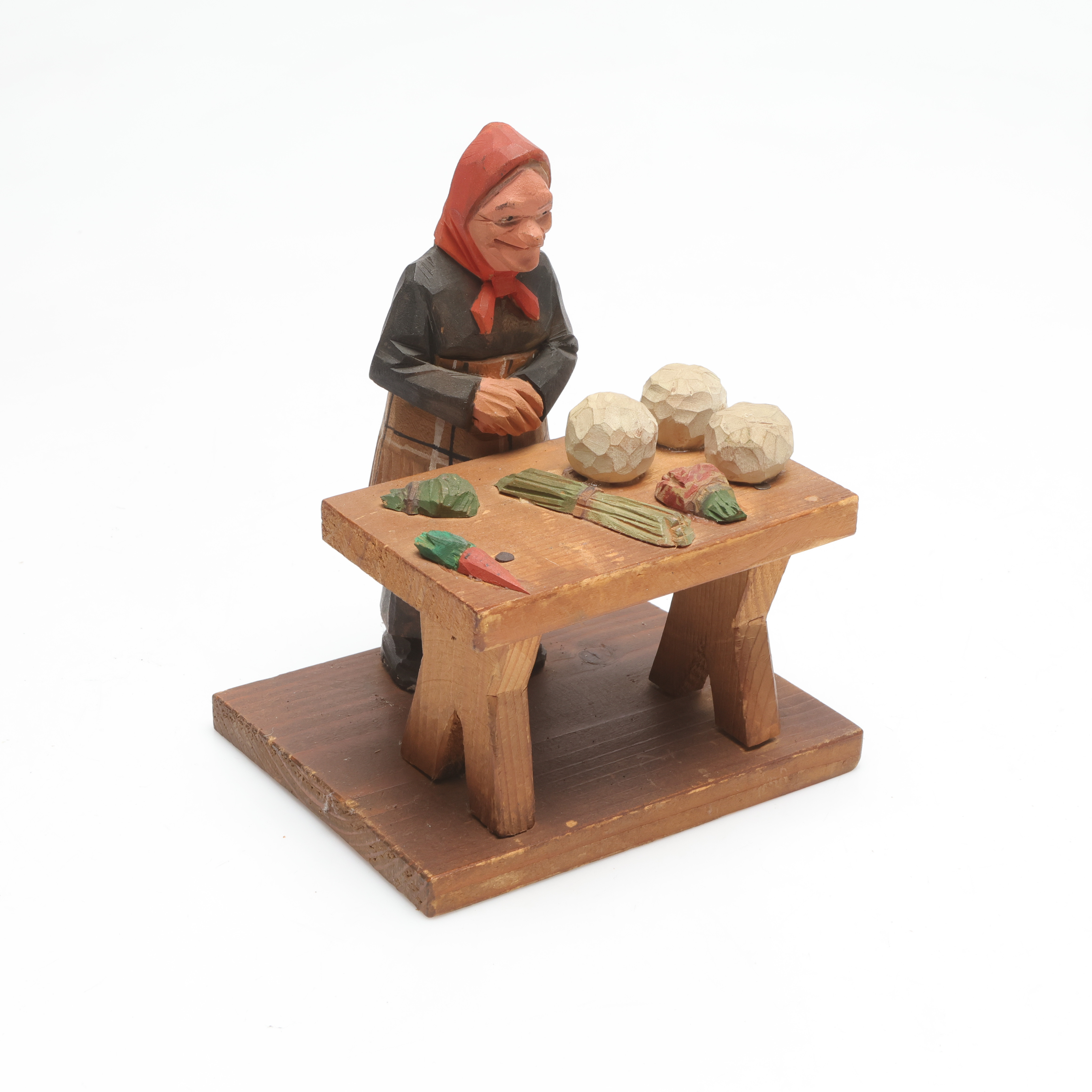 CARL OLOF TRYGG. Torggumma, skuret och bemålat trä.