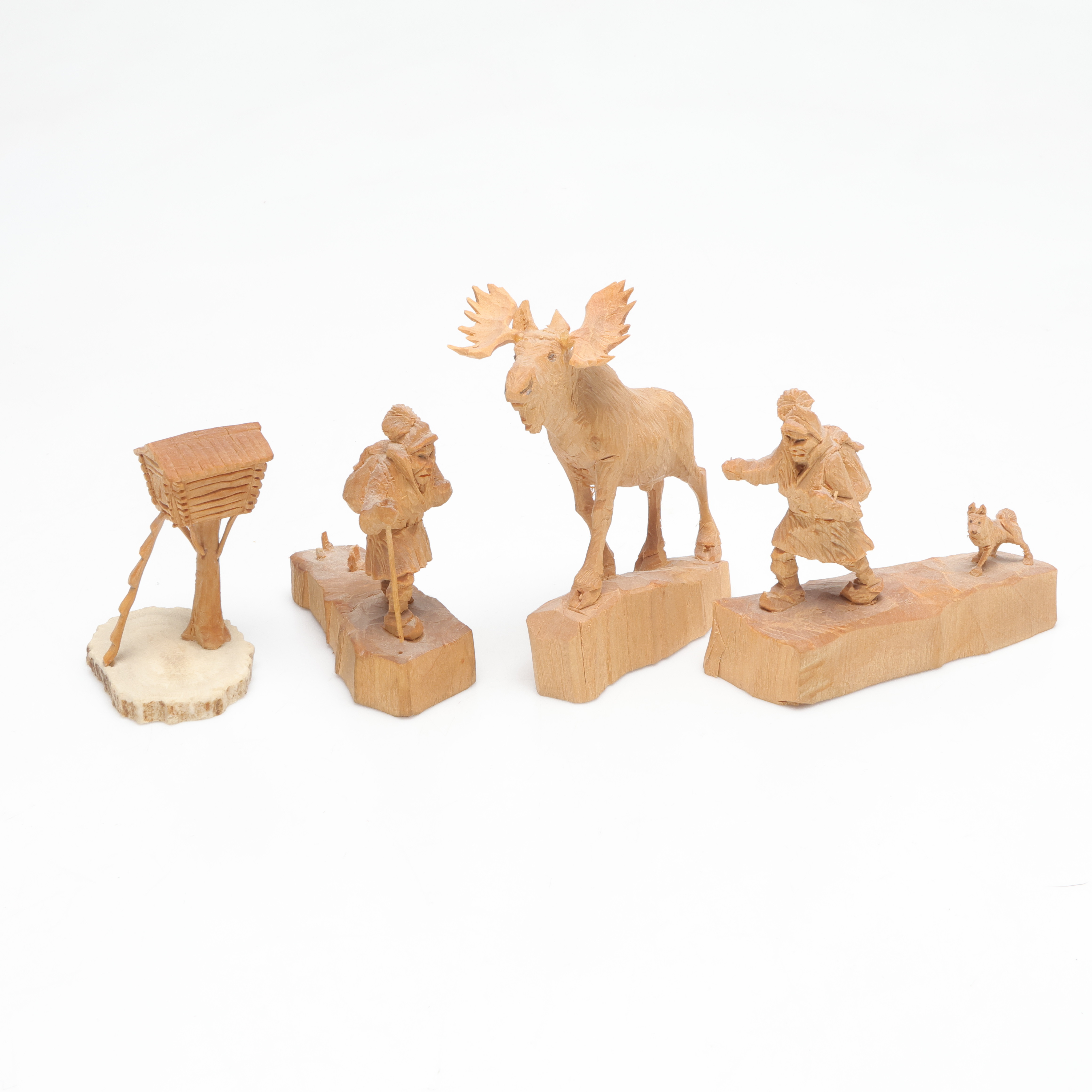 MARTIN STENSTRÖM (1912-2001). skulpturer, 4 st, samer och älg, skuret trä, monogramsignerad M.S.