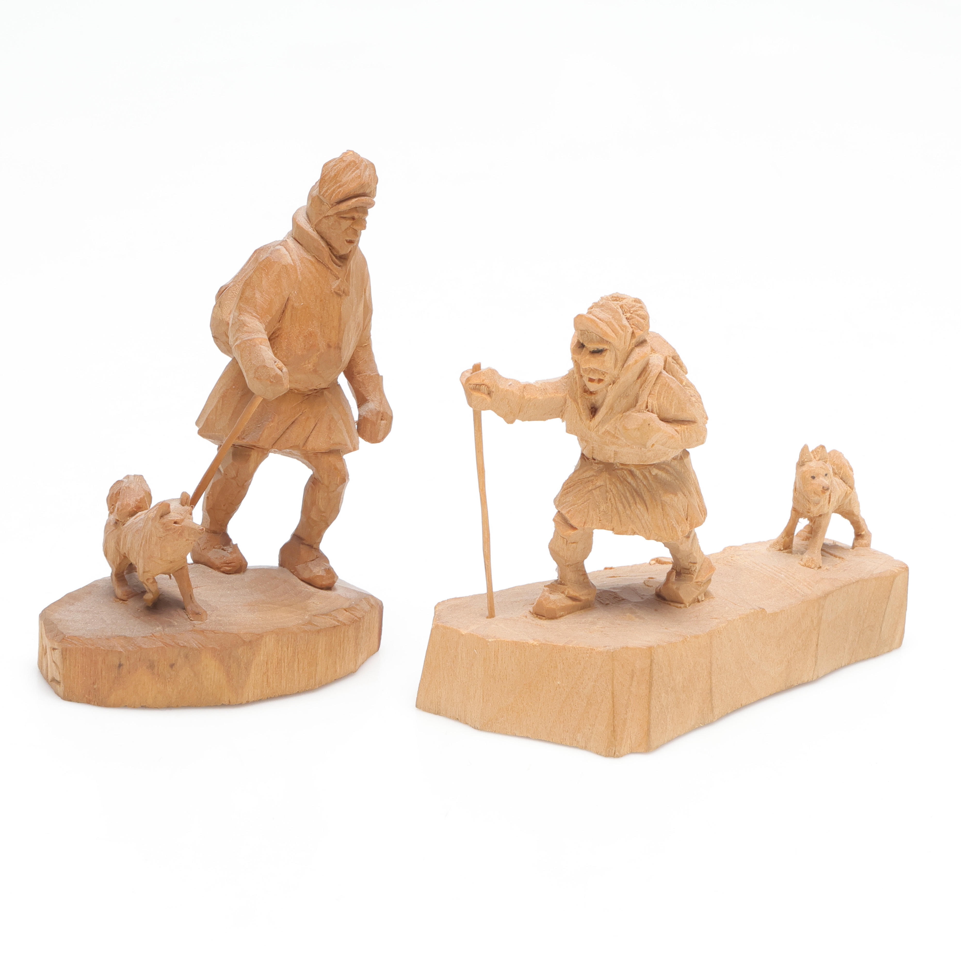 MARTIN STENSTRÖM (1912-2001). skulpturer, 2 st, samer och hundar, skuret trä, monogramsignerad M.S.