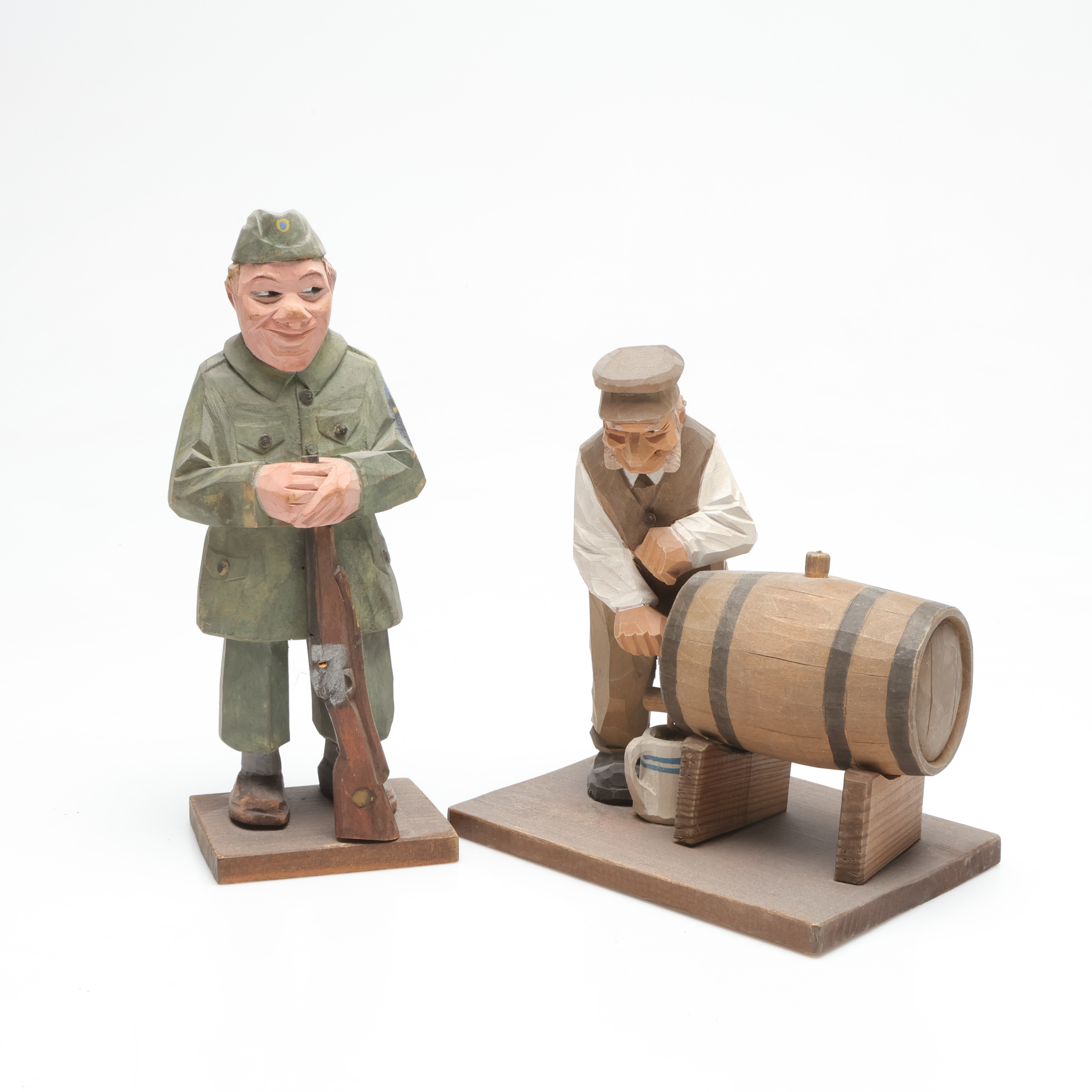 SKULPTURER, 2 st, snidat trä, Carl Johan Trygg samt Carl Olof Trygg.