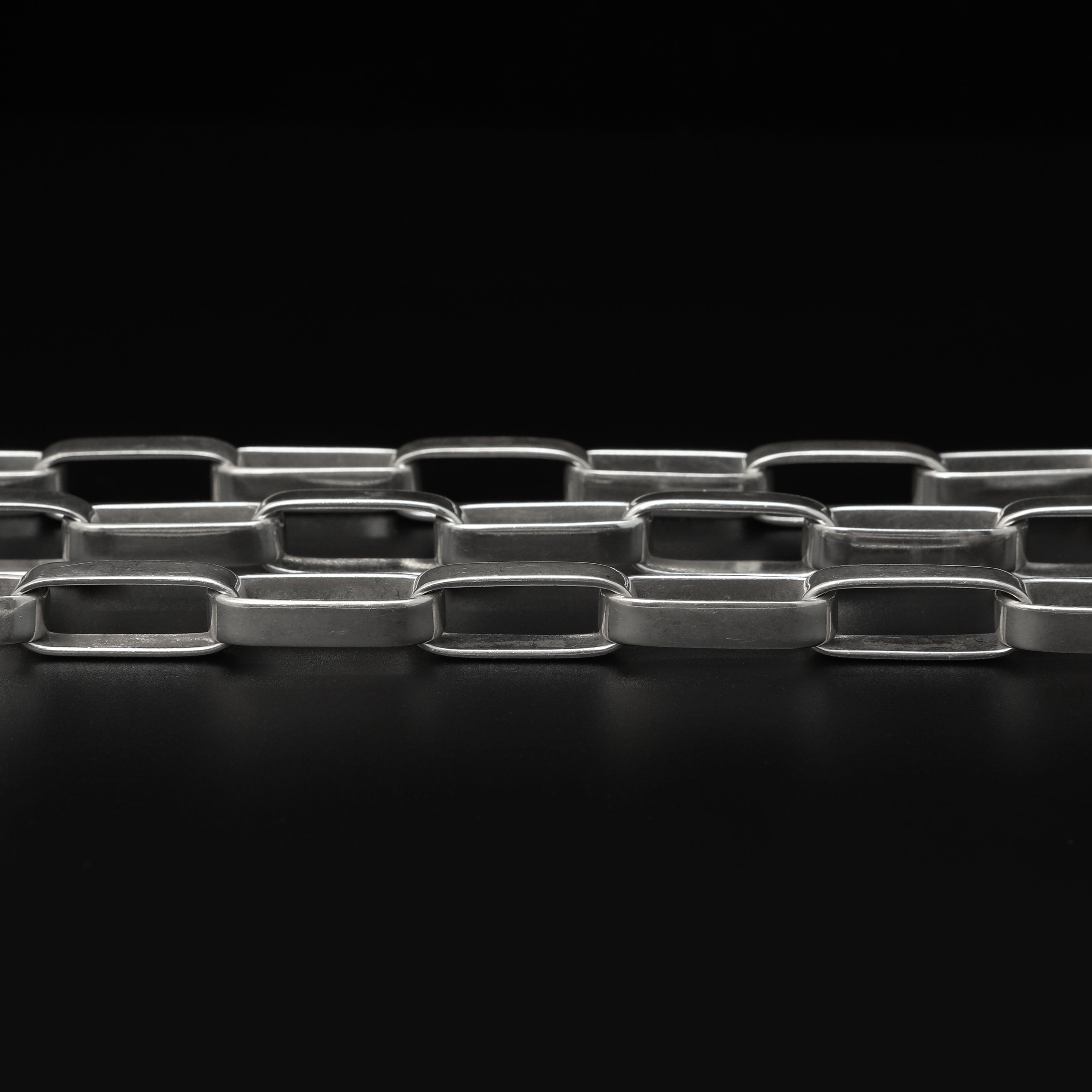 GÖRAN KUHLIN. Halskedja och armlänk, sterlingsilver, Göteborg 1993.