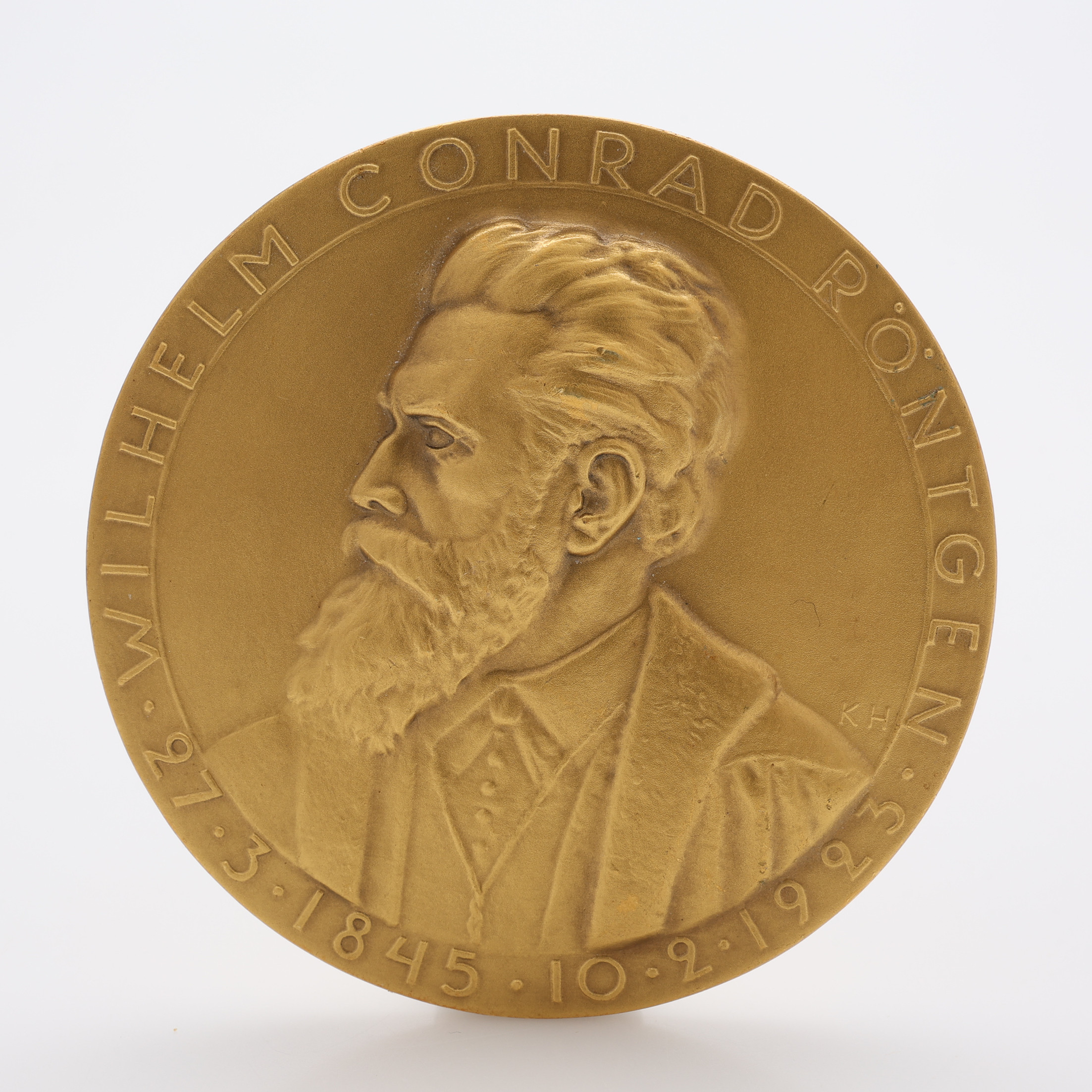MEDALJ, 18 K GULD, 114,3 g.
