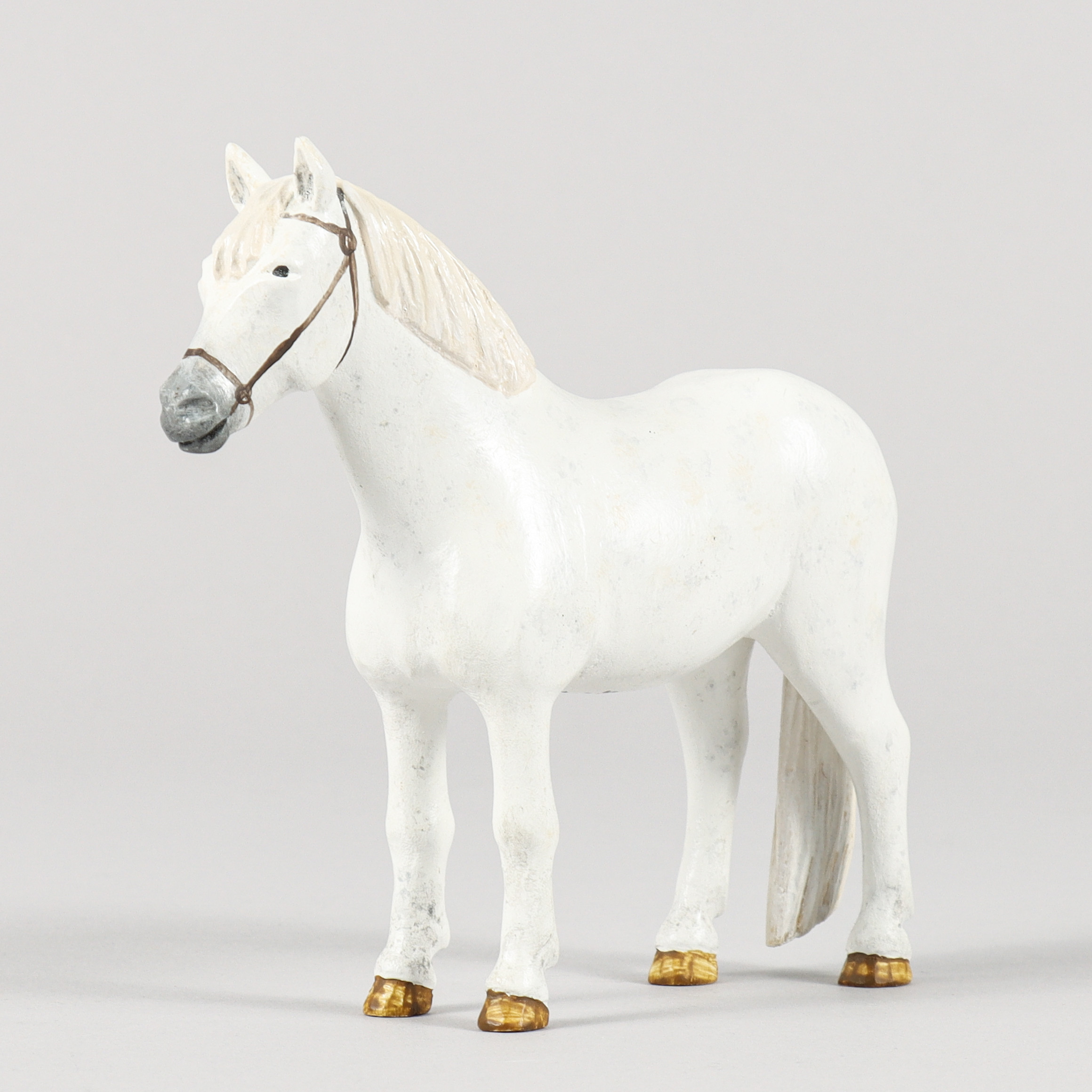 MARCIS VIDZEM. Häst skuret trä, signerad.