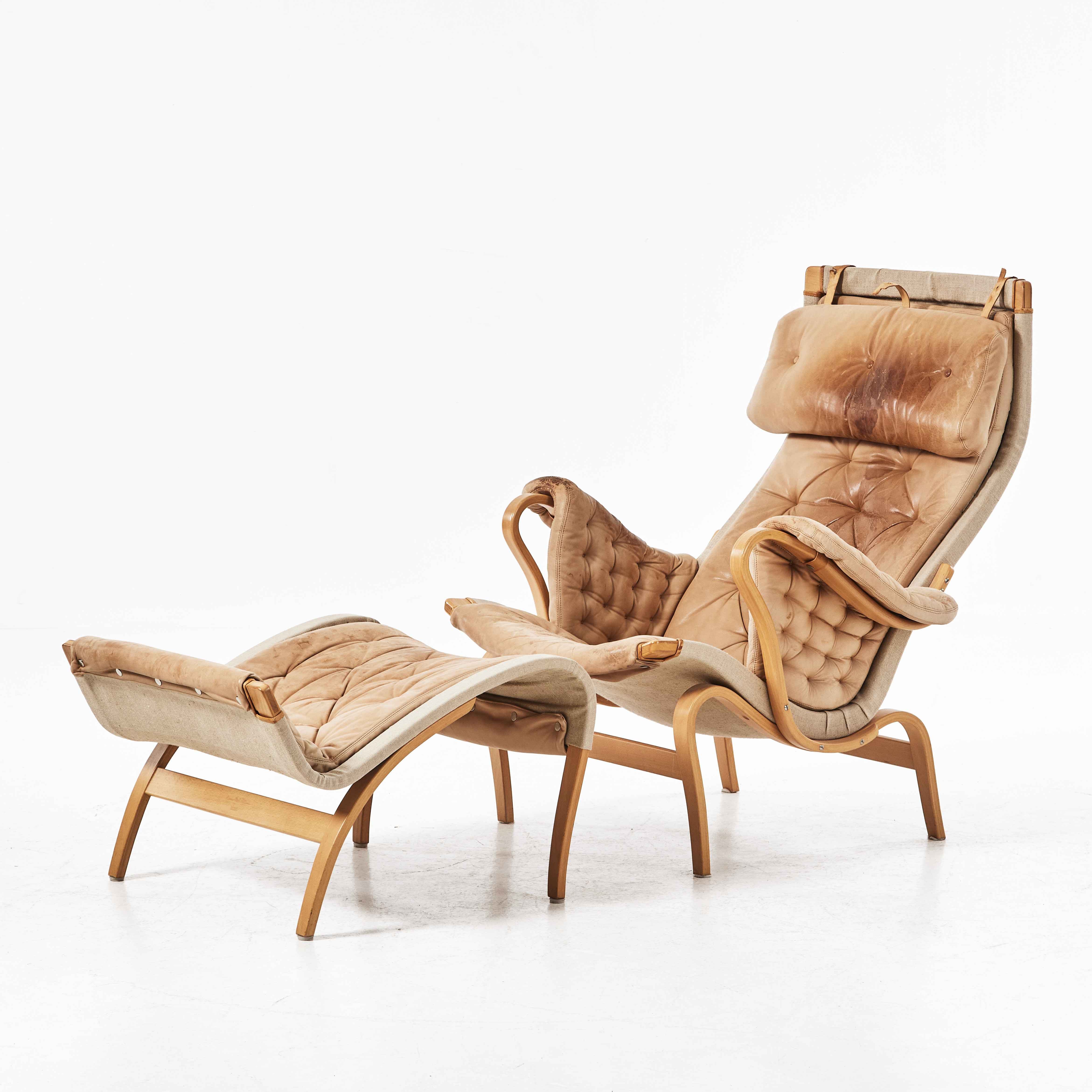 BRUNO MATHSSON. Fåtölj med fotpall, " Pernilla", DUX.