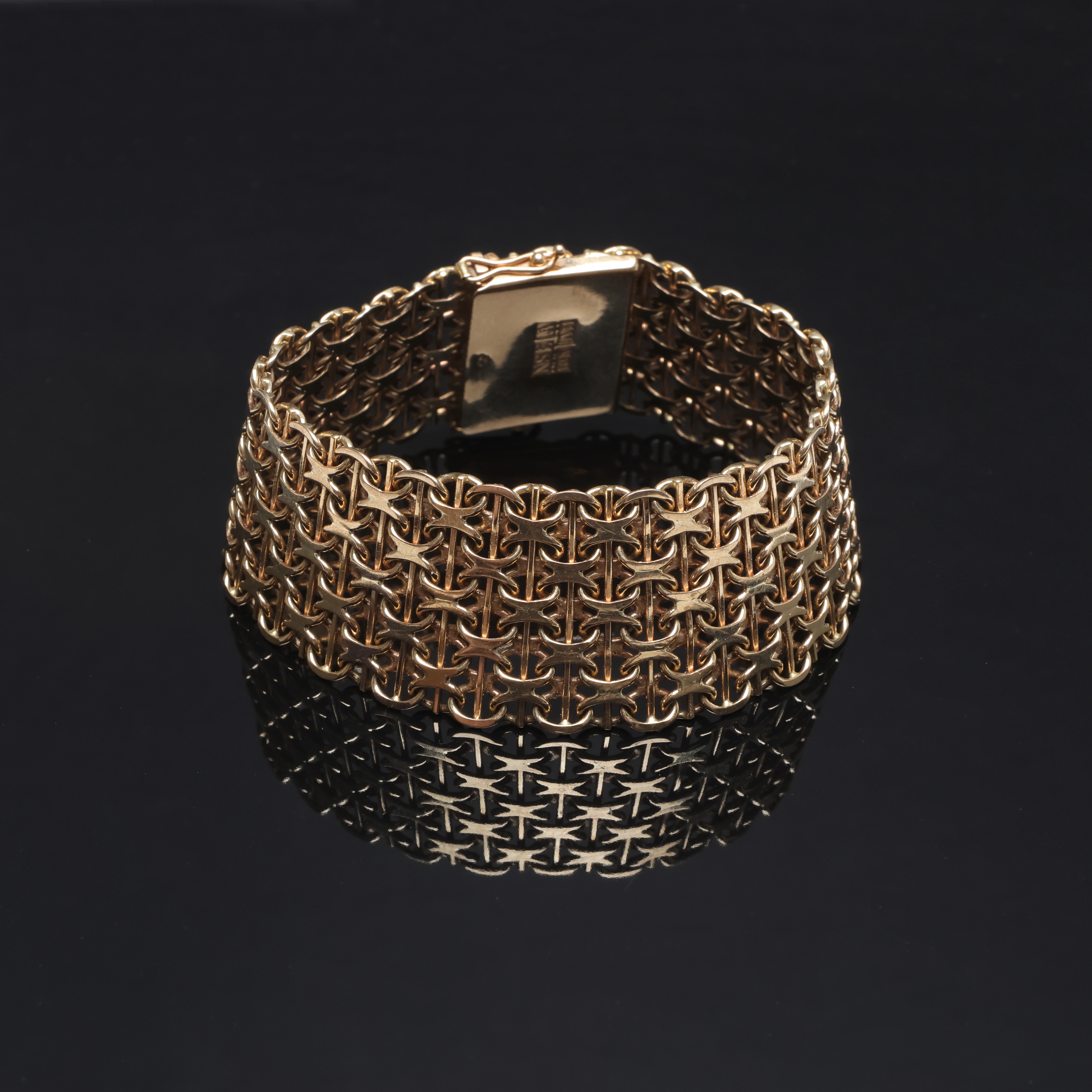 ARMBAND, ''x-länk'', 18k guld vikt ca 51 g.