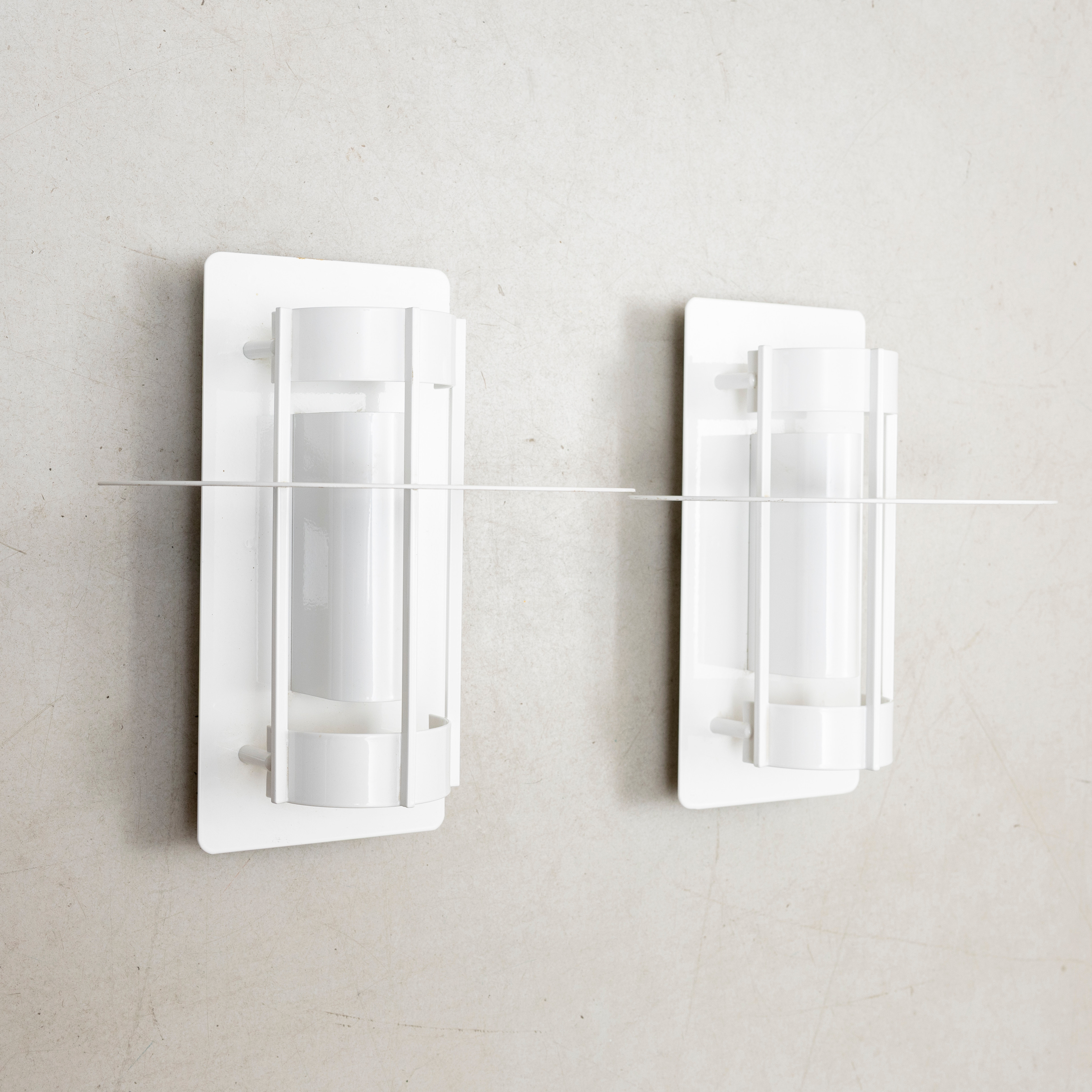 JOACHIM LEPPER. Vägglampor, ett par, "Saturn", för Louis Poulsen.