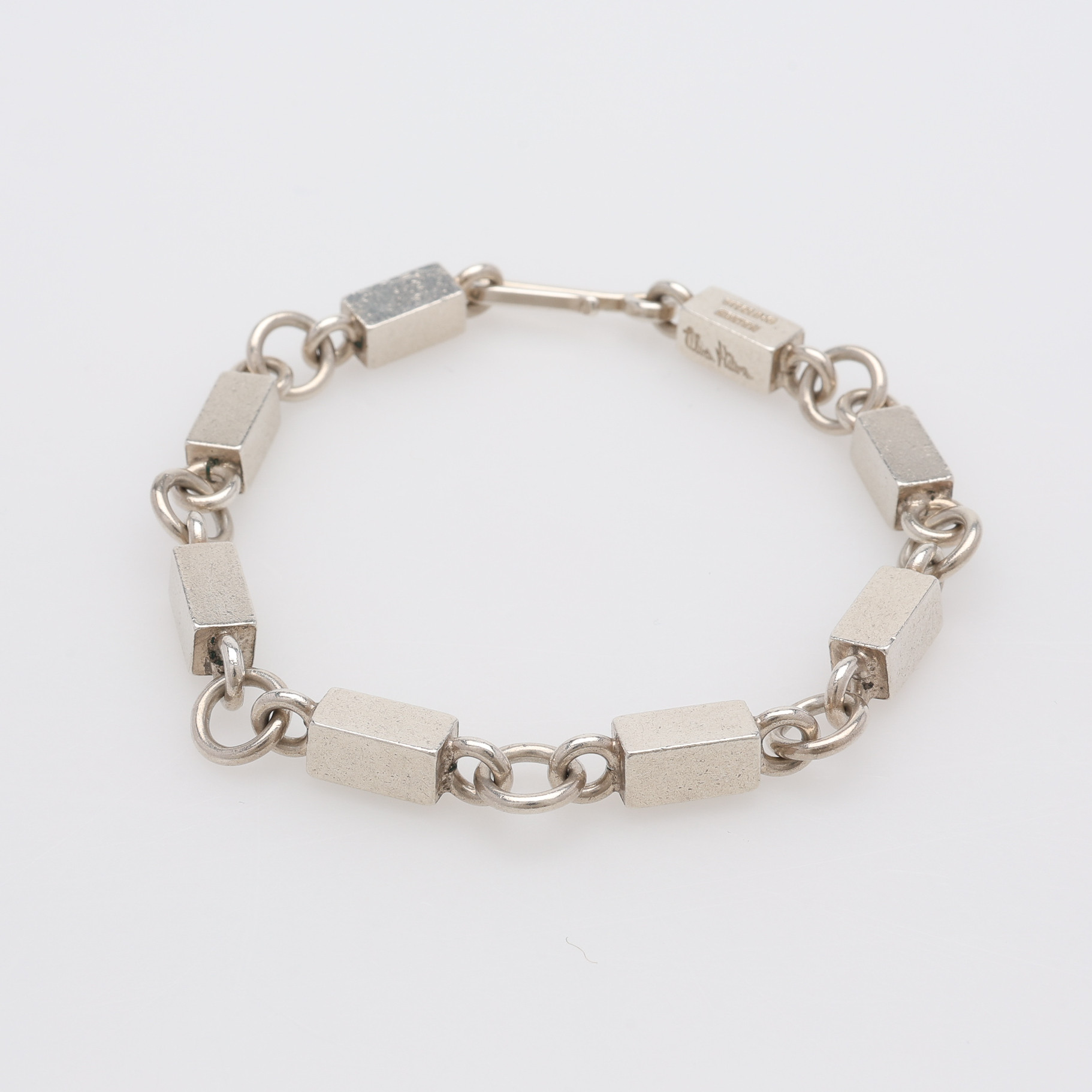 WIWEN NILSSON. ARMBAND, STERLINGSILVER, RING- & STAVLÄNK, STÄMPELSIGNERAT, LUND, 1971.