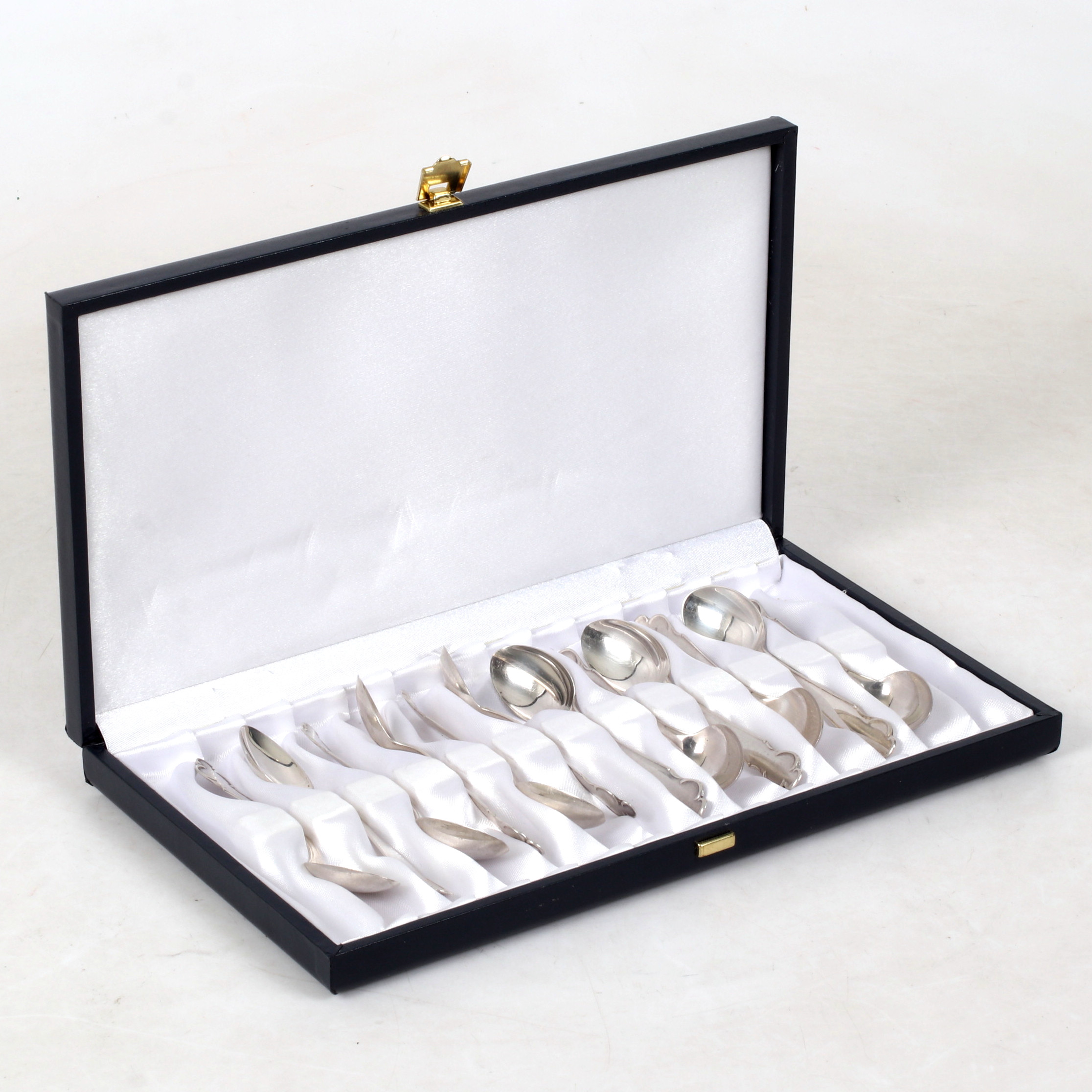 KAFFESKEDAR, 12 st. silver, modell "Disa", K. G. Markströms Guldsmeds Ab, Uppsala . 1960-tal. Vikt 165,5 gram.