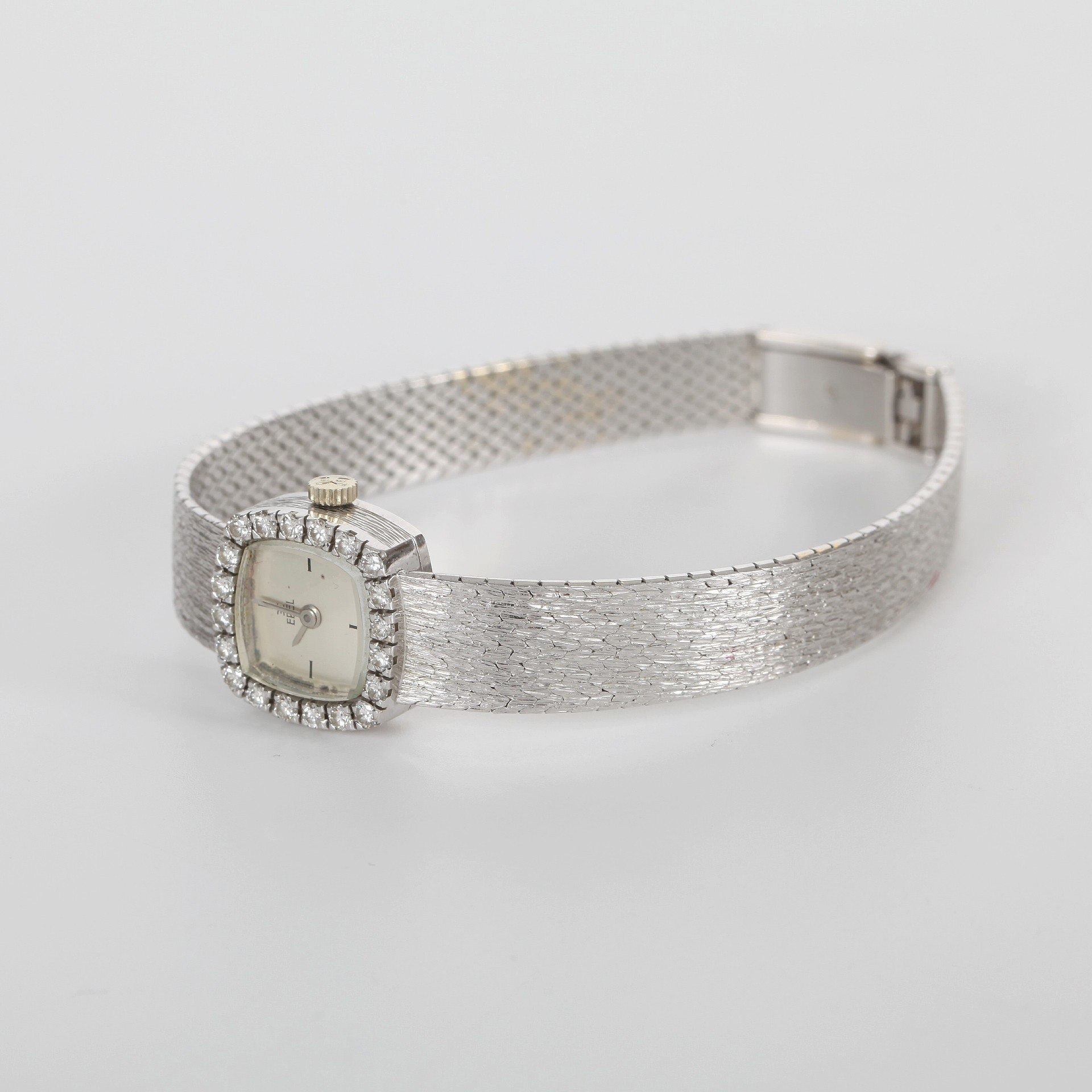 DAMARMBANDSUR EBEL, 18K vitguld och diamanter tot 0,50ct, manuell.