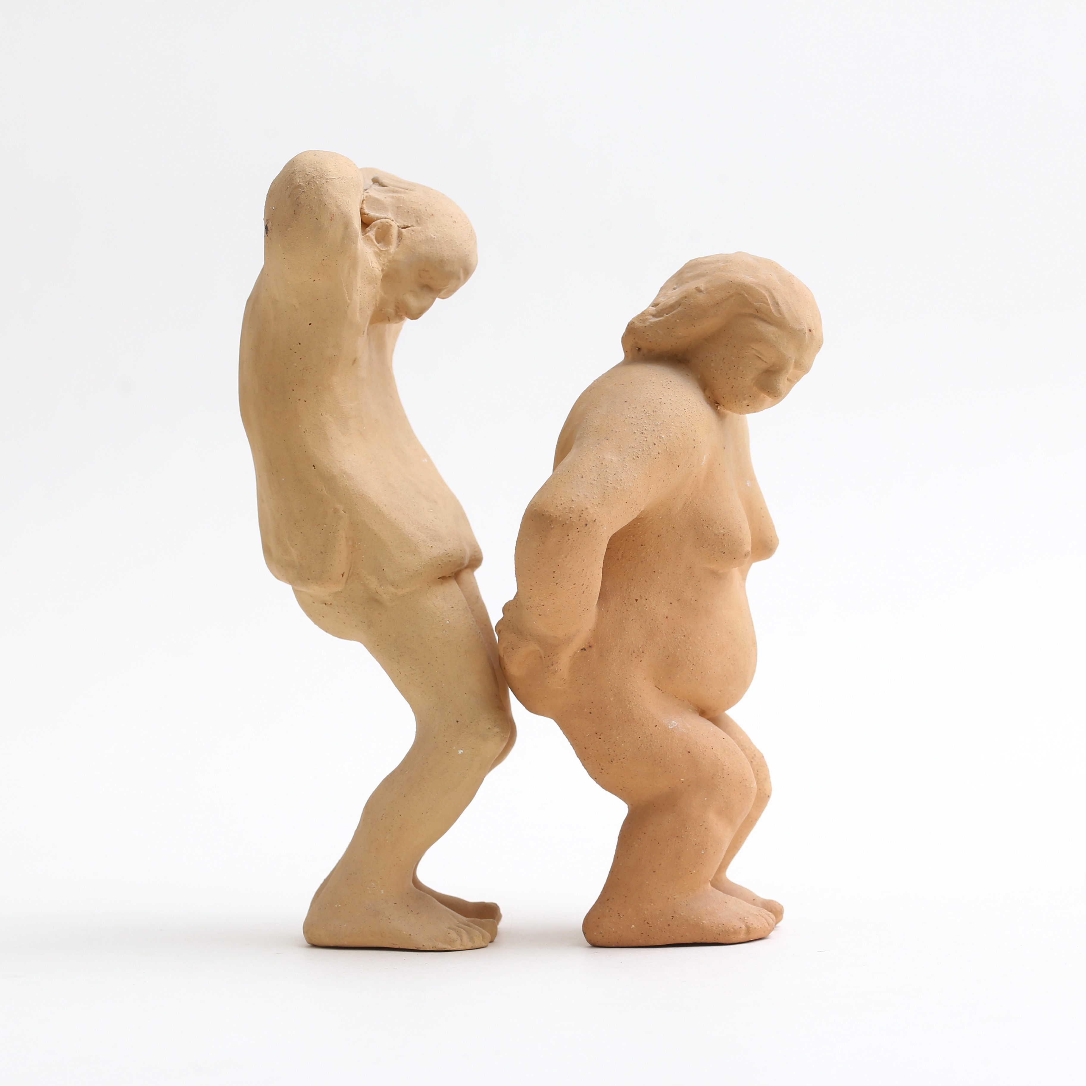 ÅKE HOLM. SKULPTURER, 2 st, kvinna och man, lergods, signerade.