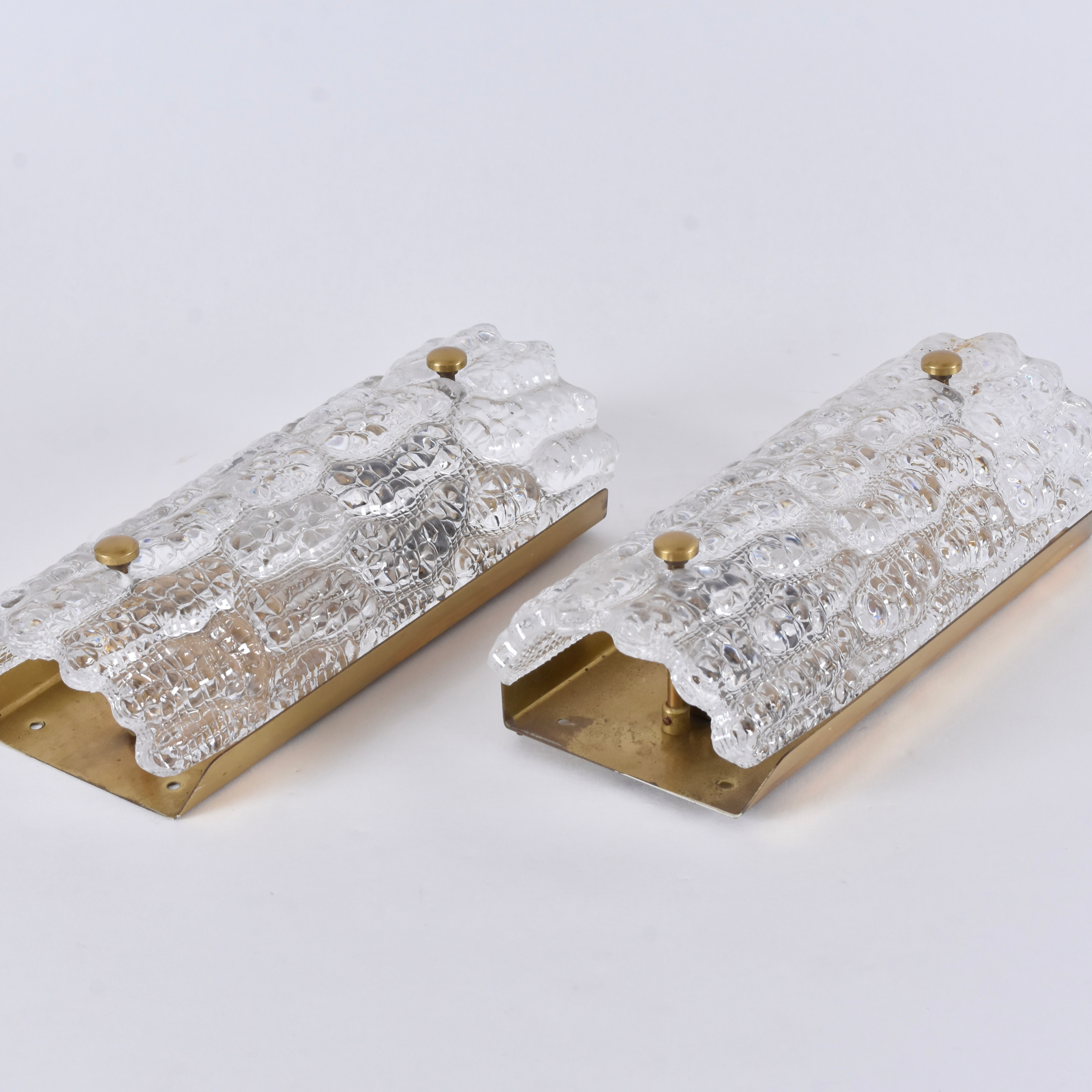 CARL FAGERLUND. Vägglampor, 1-par, mässing/glas, Orrefors.