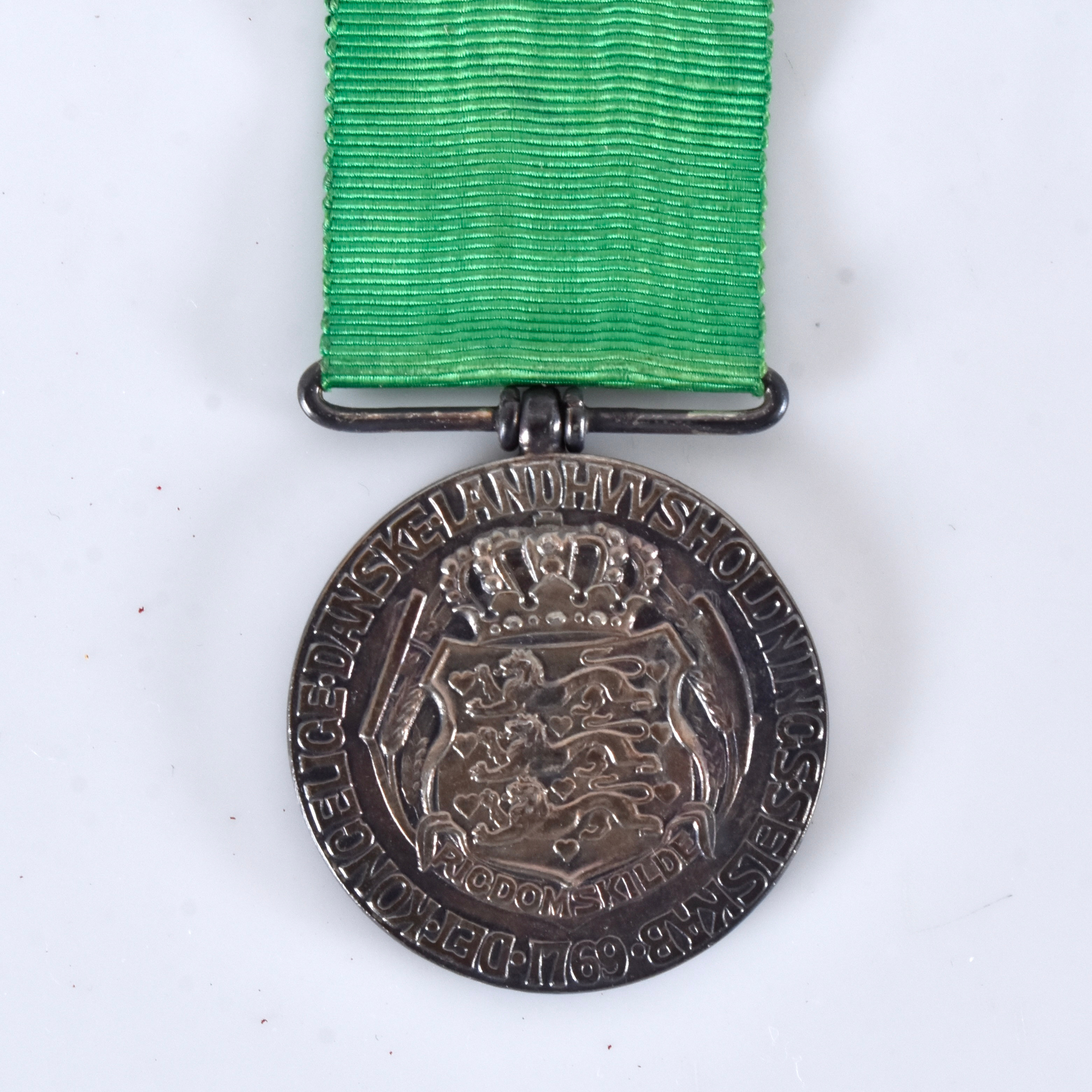 SILVERMEDALJ, danska Hæderspris for Landarbejde.