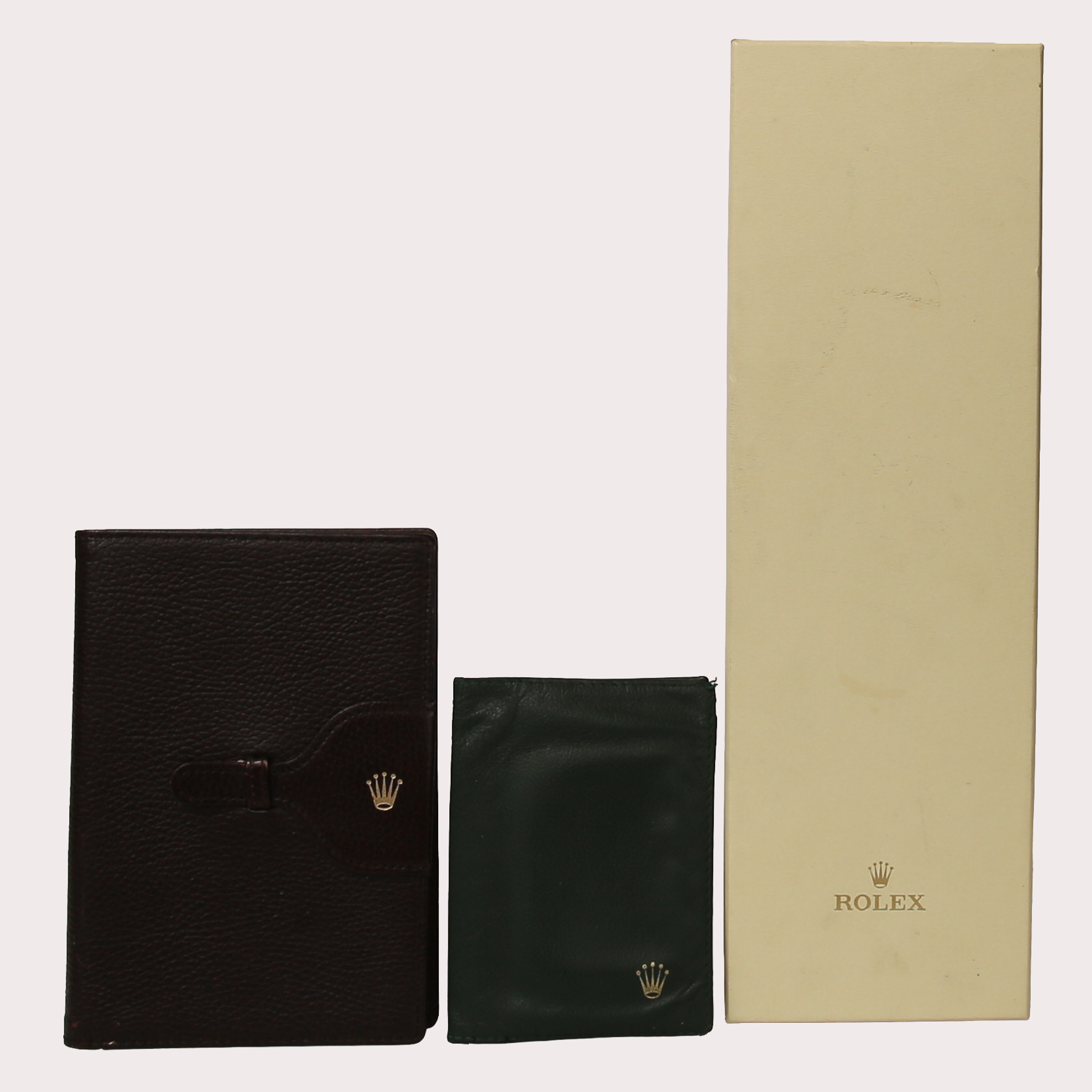 ROLEX RELATERAD MEMOROBILIA, slips, plånbok och notisblock, 1900-tal.