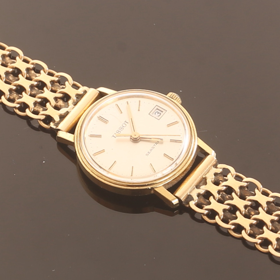 DAMARMBANDSUR, Tissot, 18 k guld.