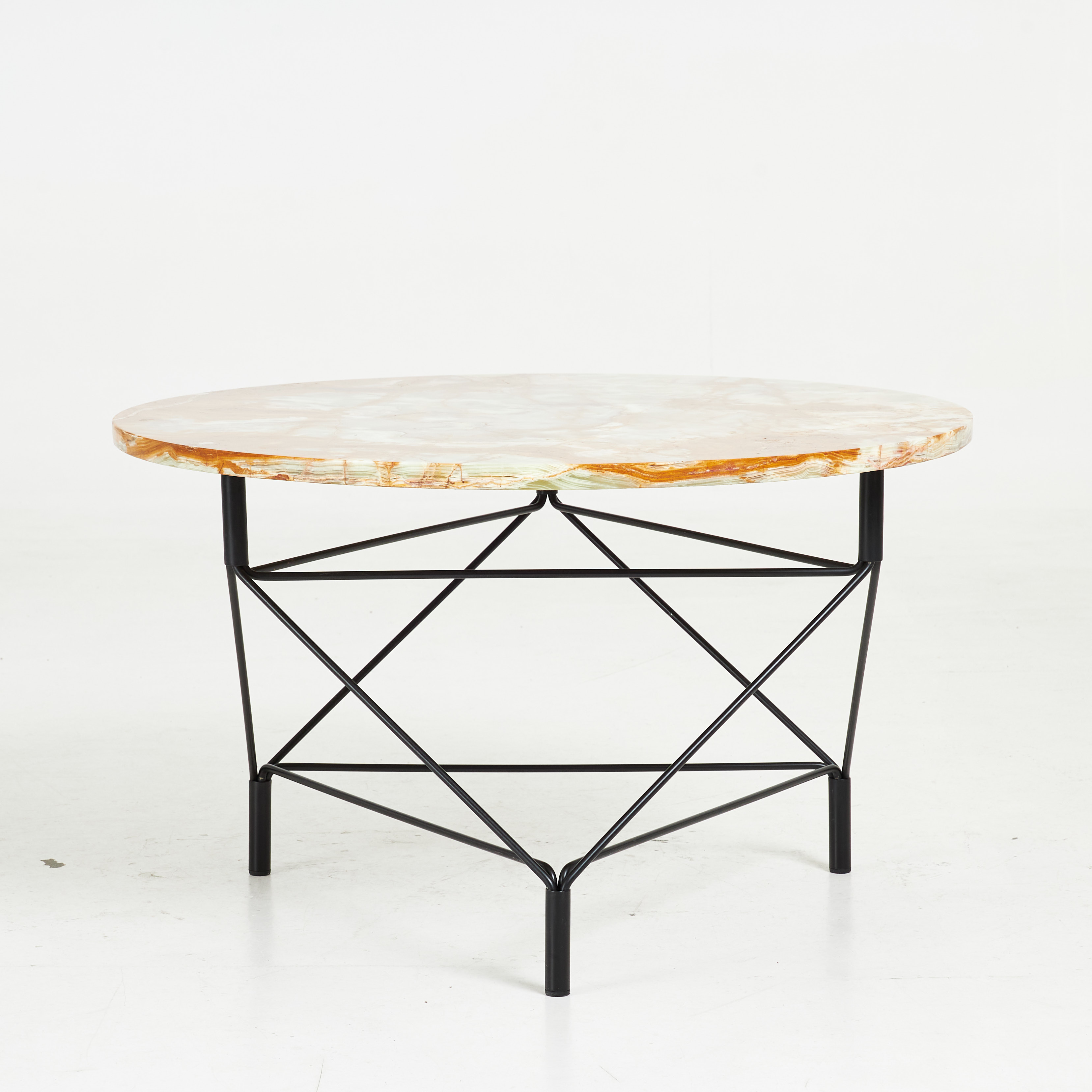 ANDREAS HANSEN. Soffbord, "Spider" underrede i svartlackerad metall, skiva i sten, för Eilersen, Danmark, samtida.