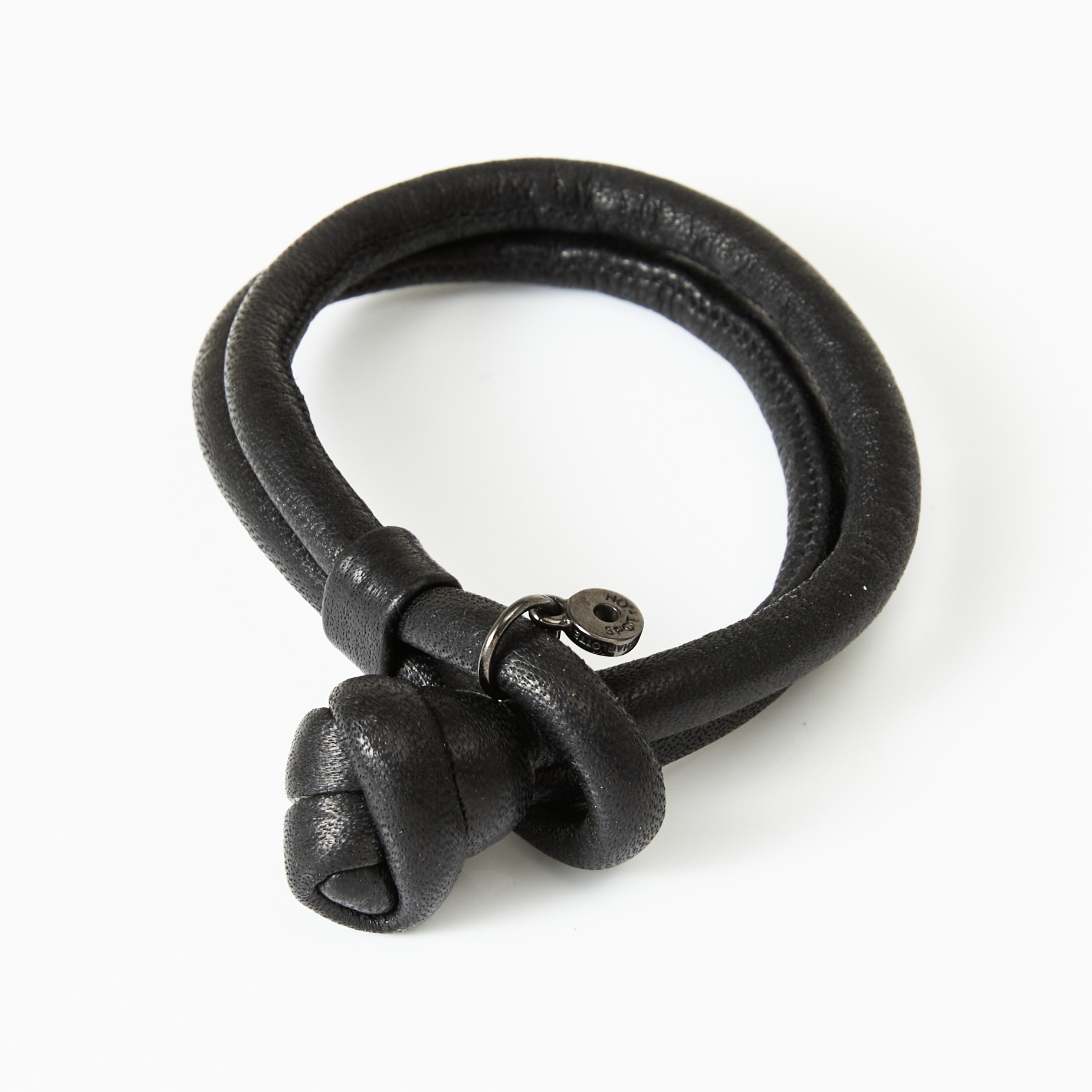 CHARLOTTE LYNGGAARD. Armband, "Spot On", läder, berlock i silver, Ole Lynggaard.